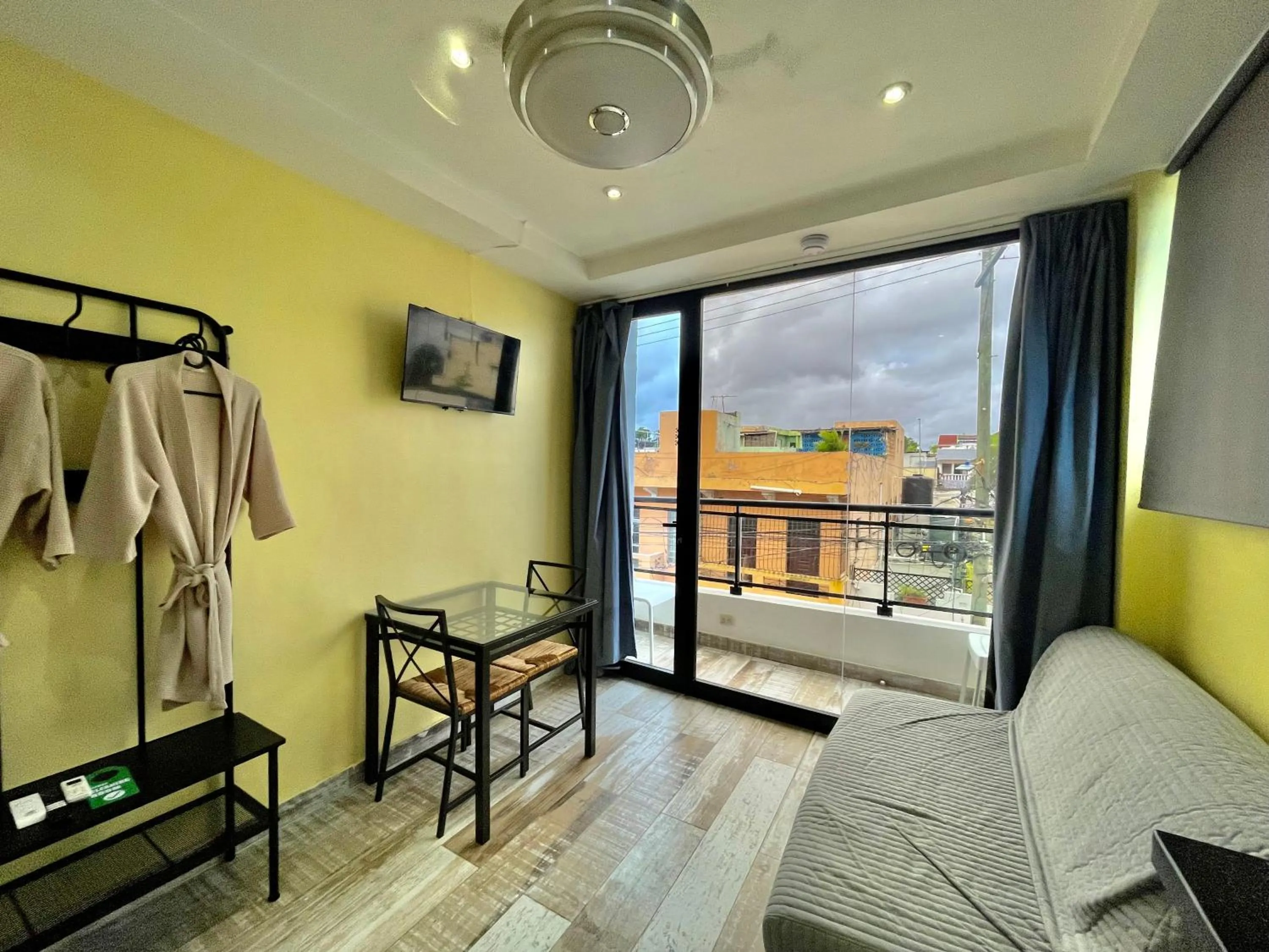 Living room, Bed in RIG Puerto Malecón