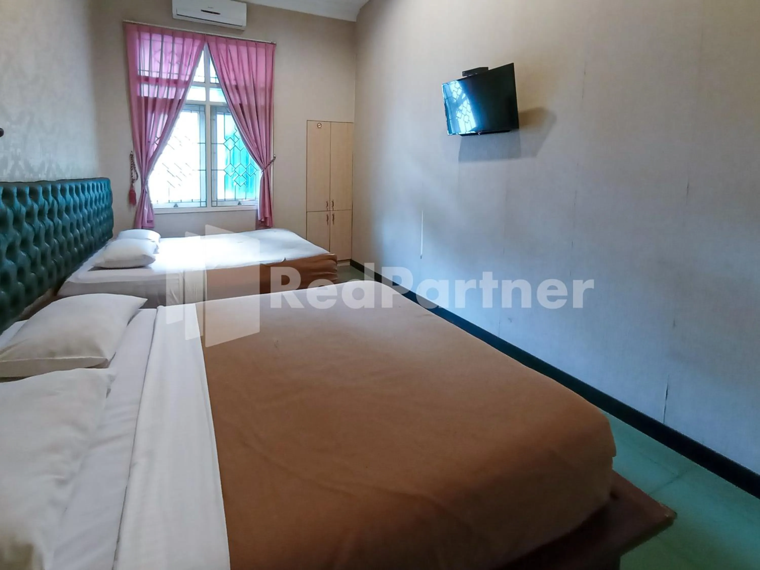 Bedroom, Bed in Nillo Hotel Kebumen Mitra RedDoorz