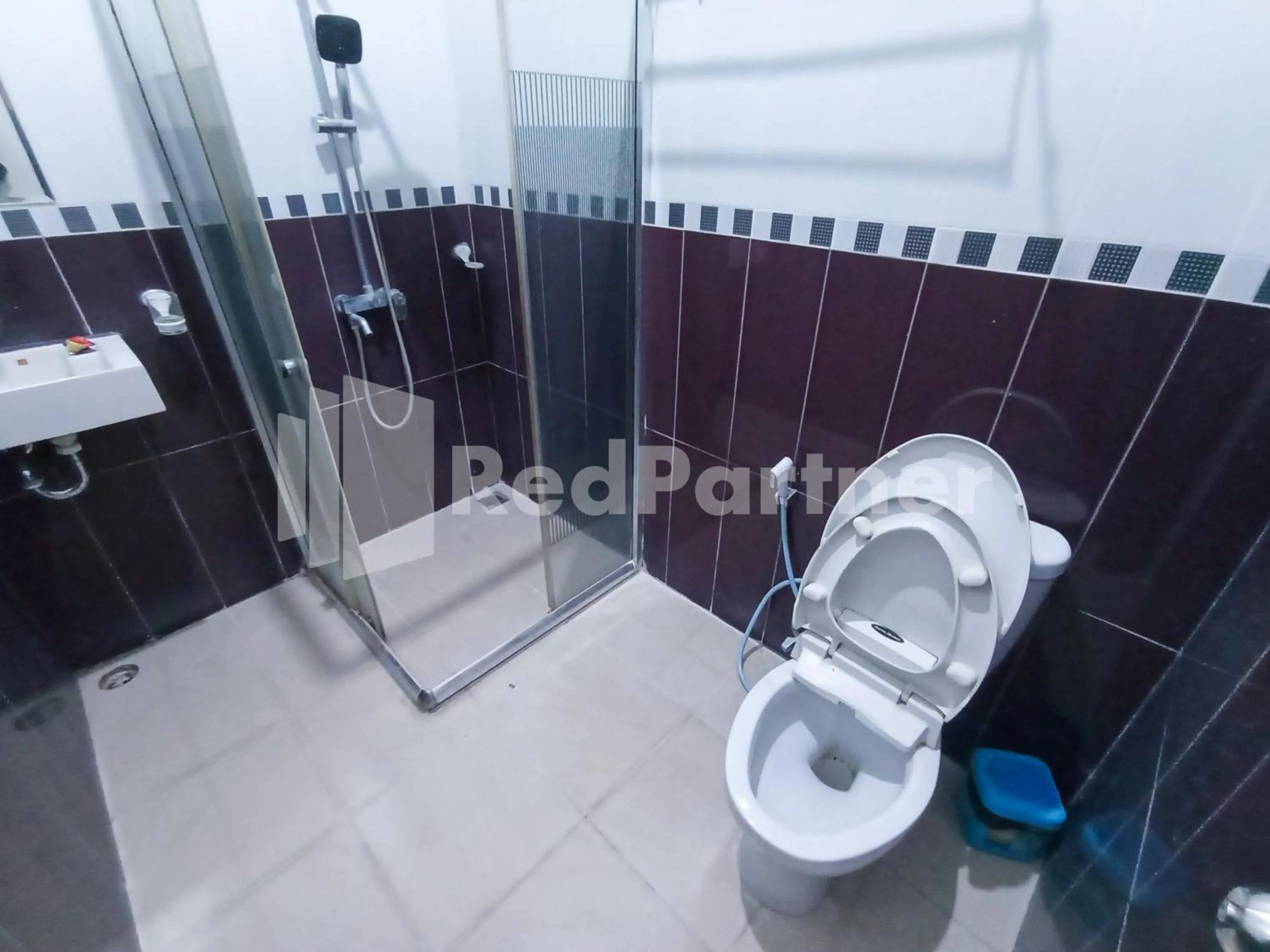 Bathroom in Nillo Hotel Kebumen Mitra RedDoorz