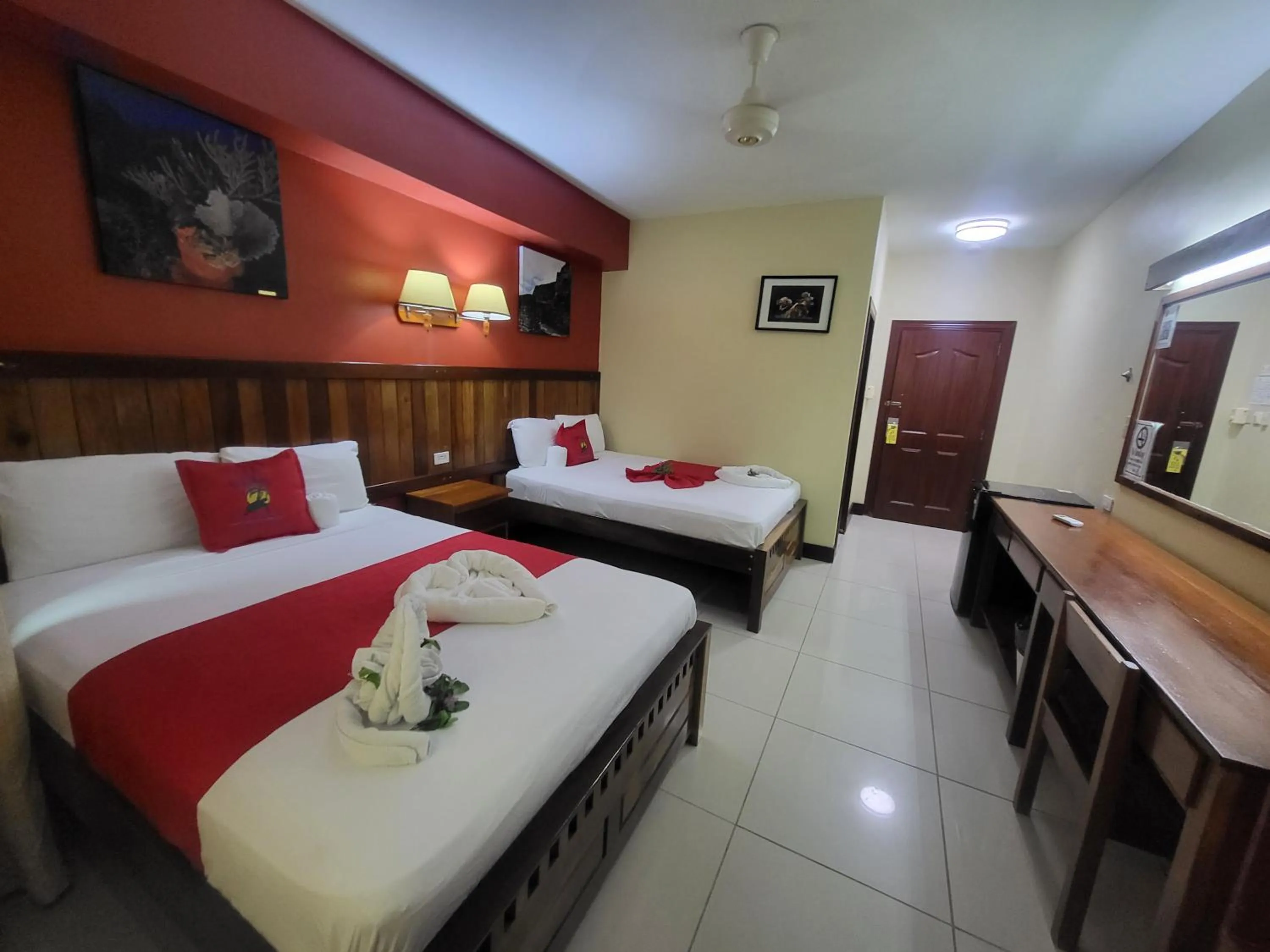 Bed in Caye Caulker Plaza Hotel