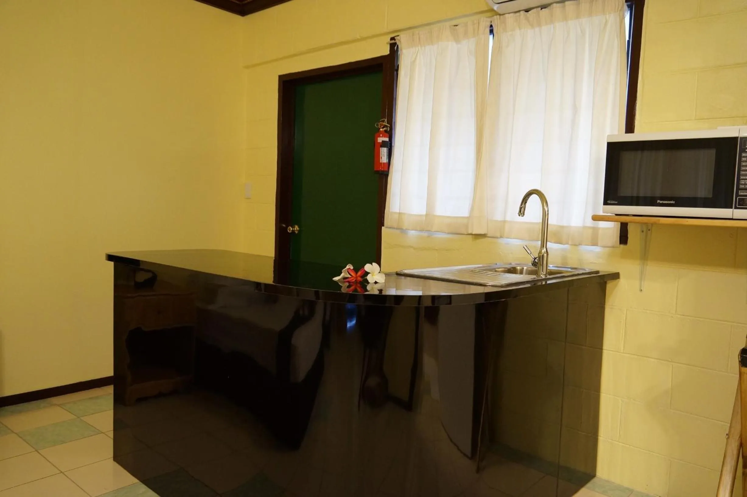 Kitchen or kitchenette in Moatoga Hotel