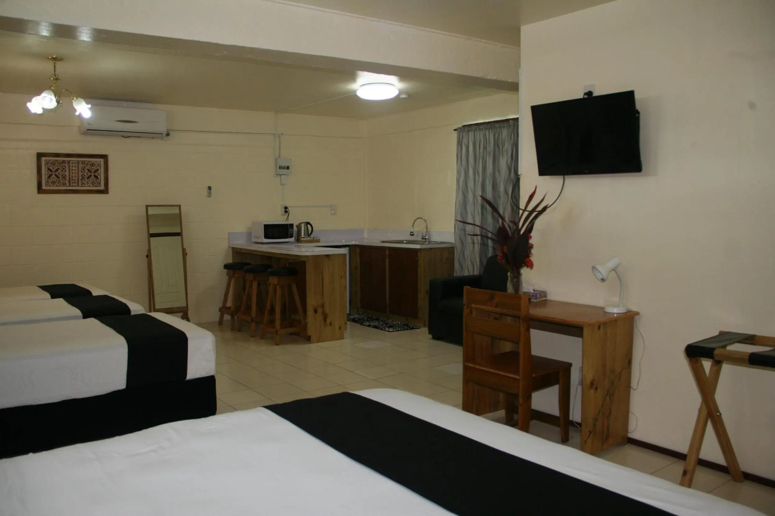 Photo of the whole room, Bed in Moatoga Hotel