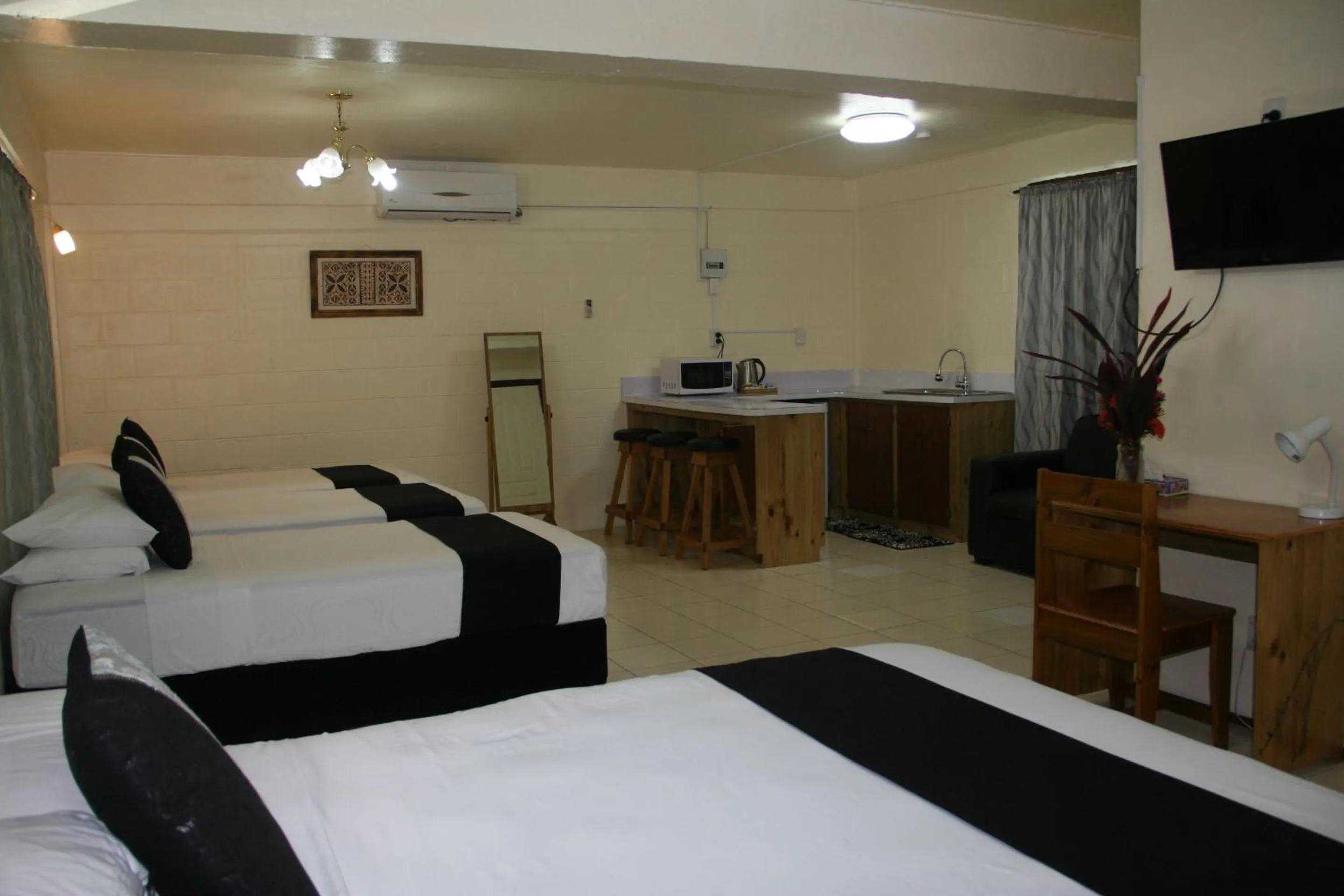 Photo of the whole room, Bed in Moatoga Hotel