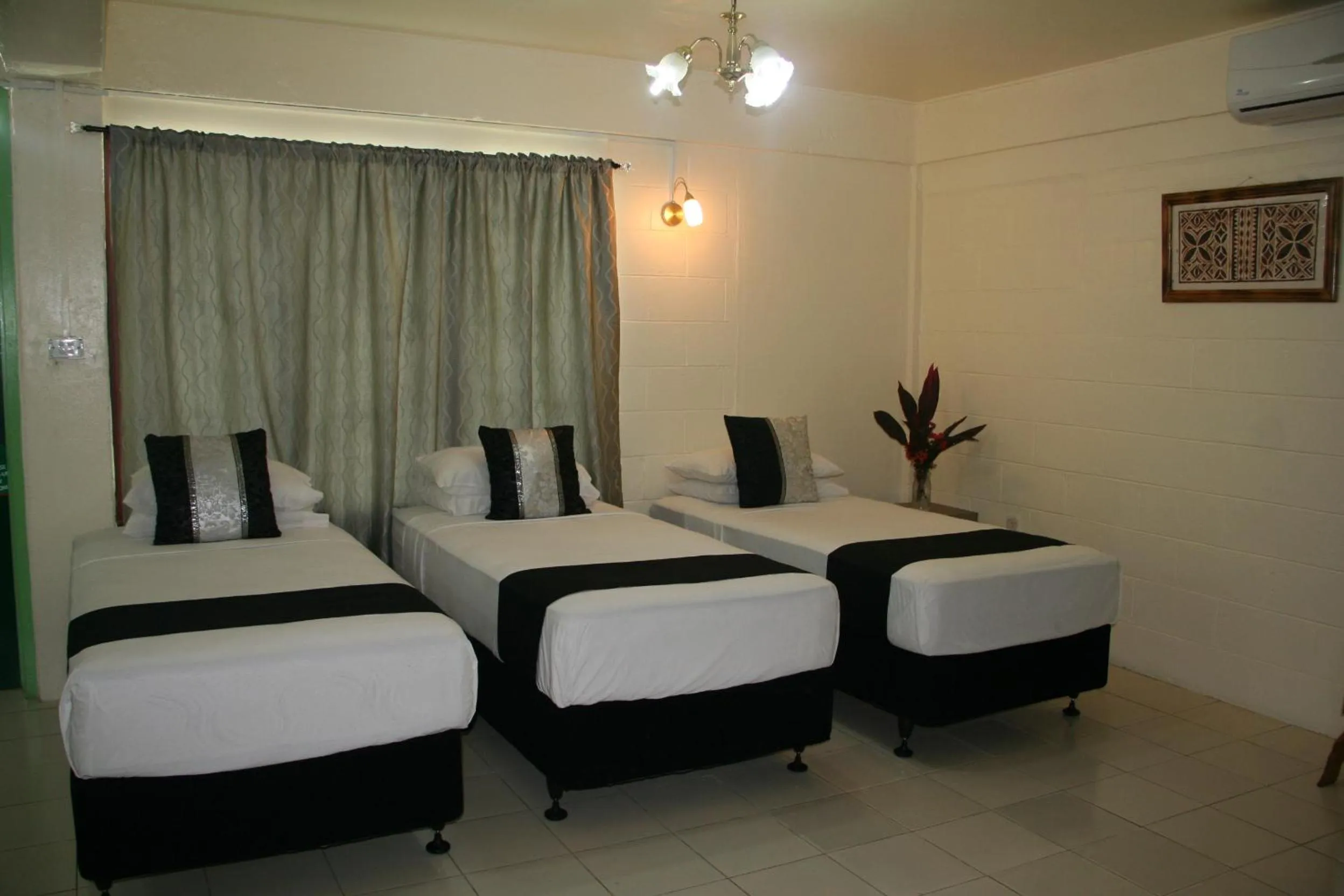 Photo of the whole room, Bed in Moatoga Hotel