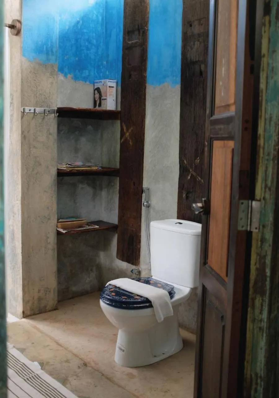 Toilet in Panji Panji Tropical Wooden Home
