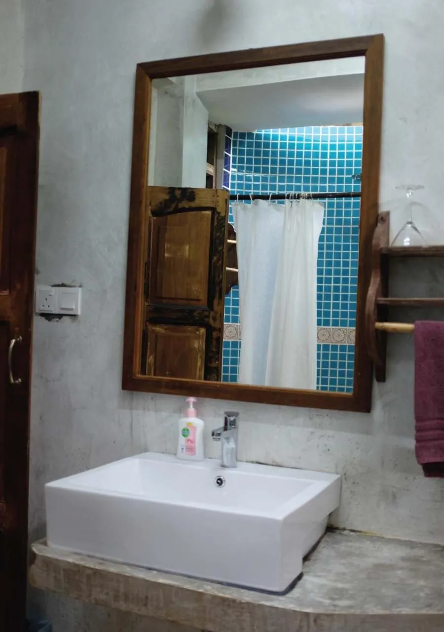 Toilet in Panji Panji Tropical Wooden Home