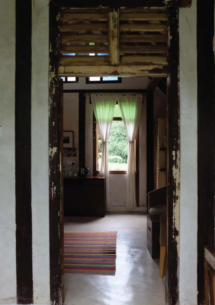 Living room in Panji Panji Tropical Wooden Home
