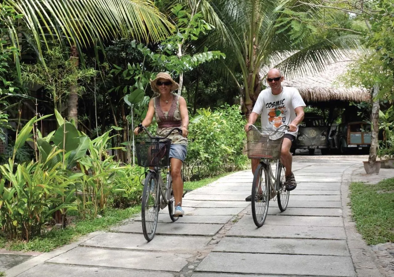 Cycling in Panji Panji Tropical Wooden Home