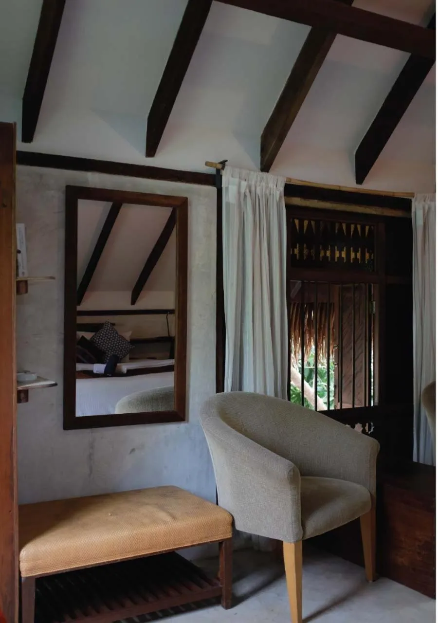 Living room, Bed in Panji Panji Tropical Wooden Home