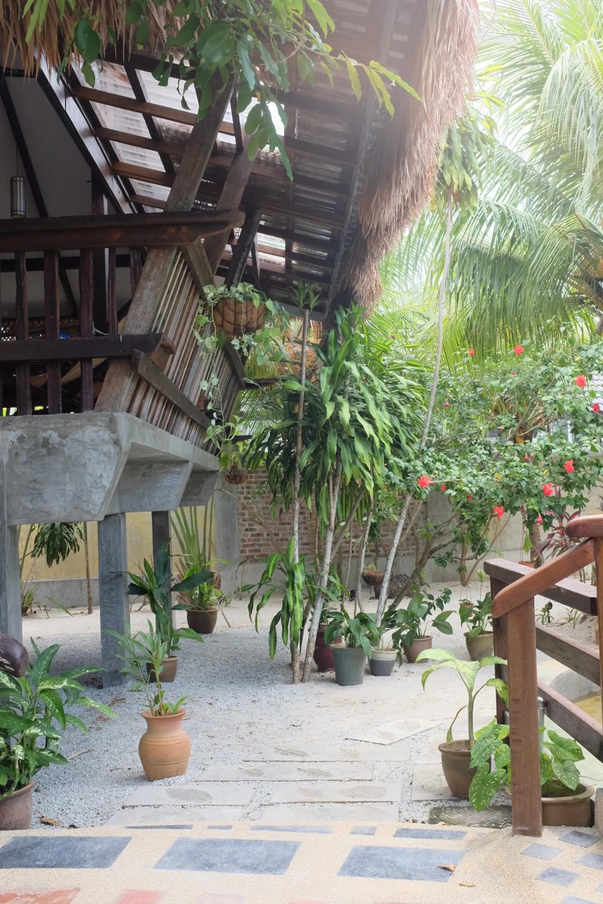 Facade/entrance in Panji Panji Tropical Wooden Home
