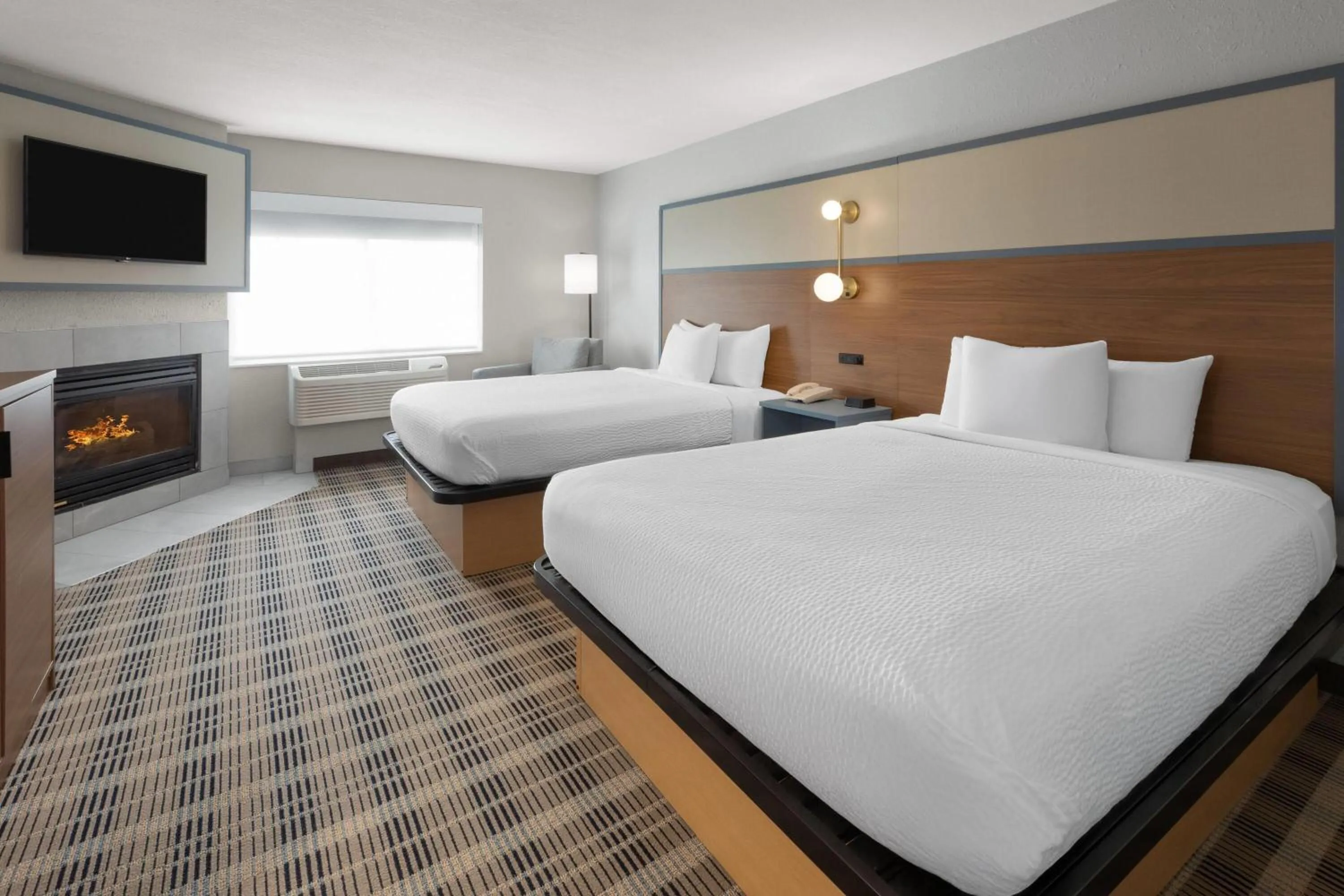 Photo of the whole room, Bed in AmericInn by Wyndham Douglas/Saugatuck