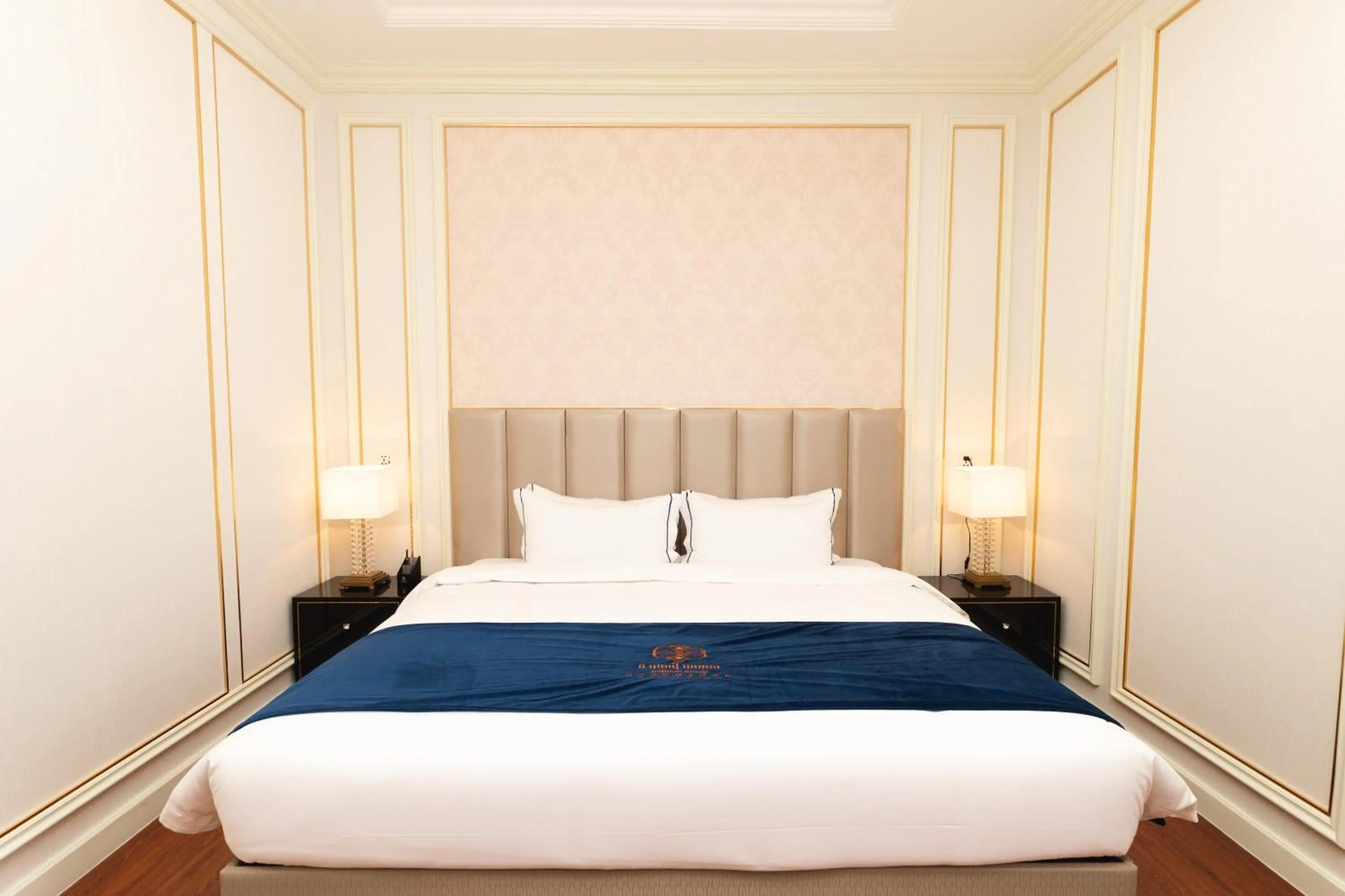 Bed in THE PREMIER PALACE HOTEL AND SPA