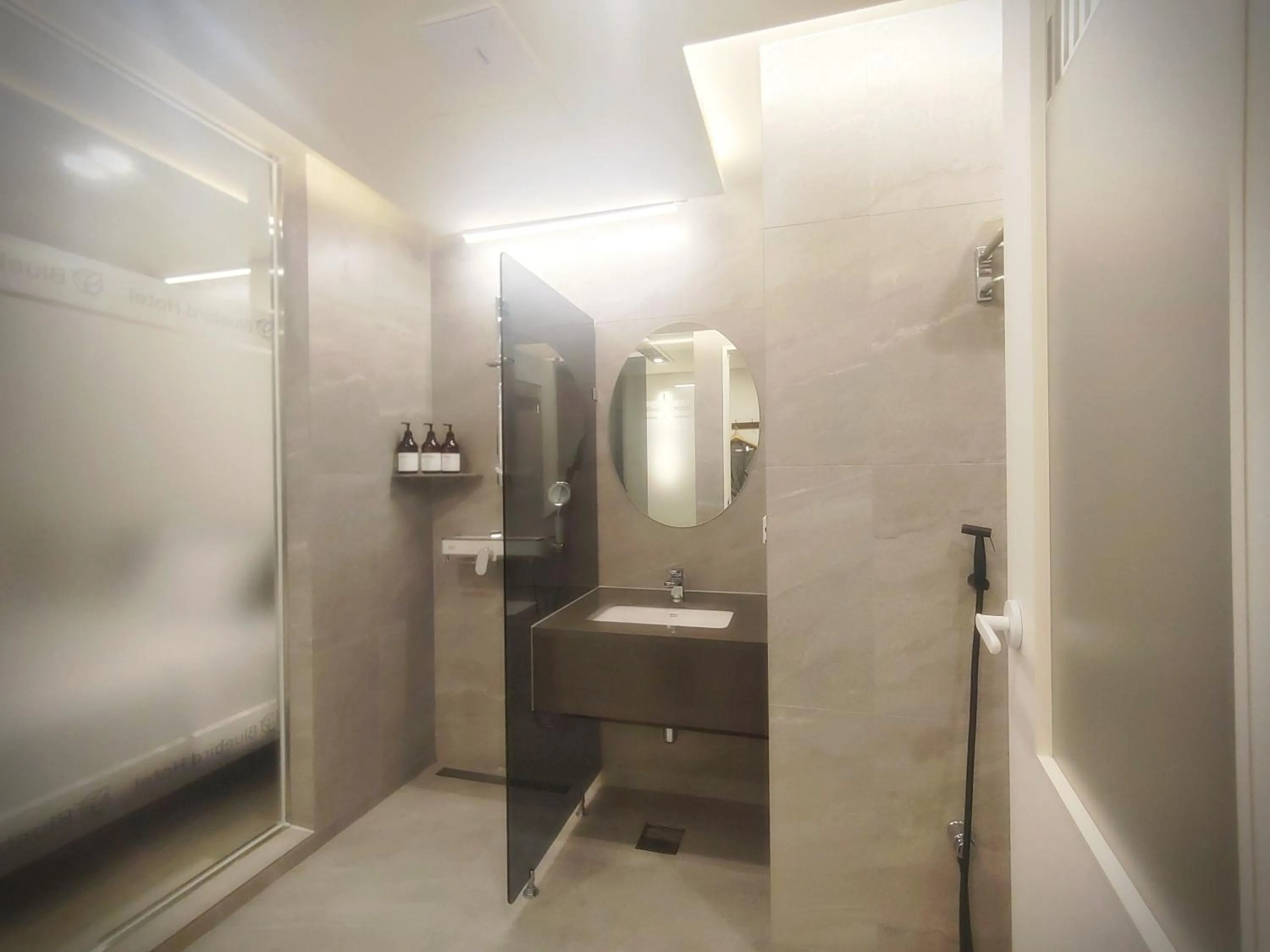 Bathroom in Bluebird Hotel