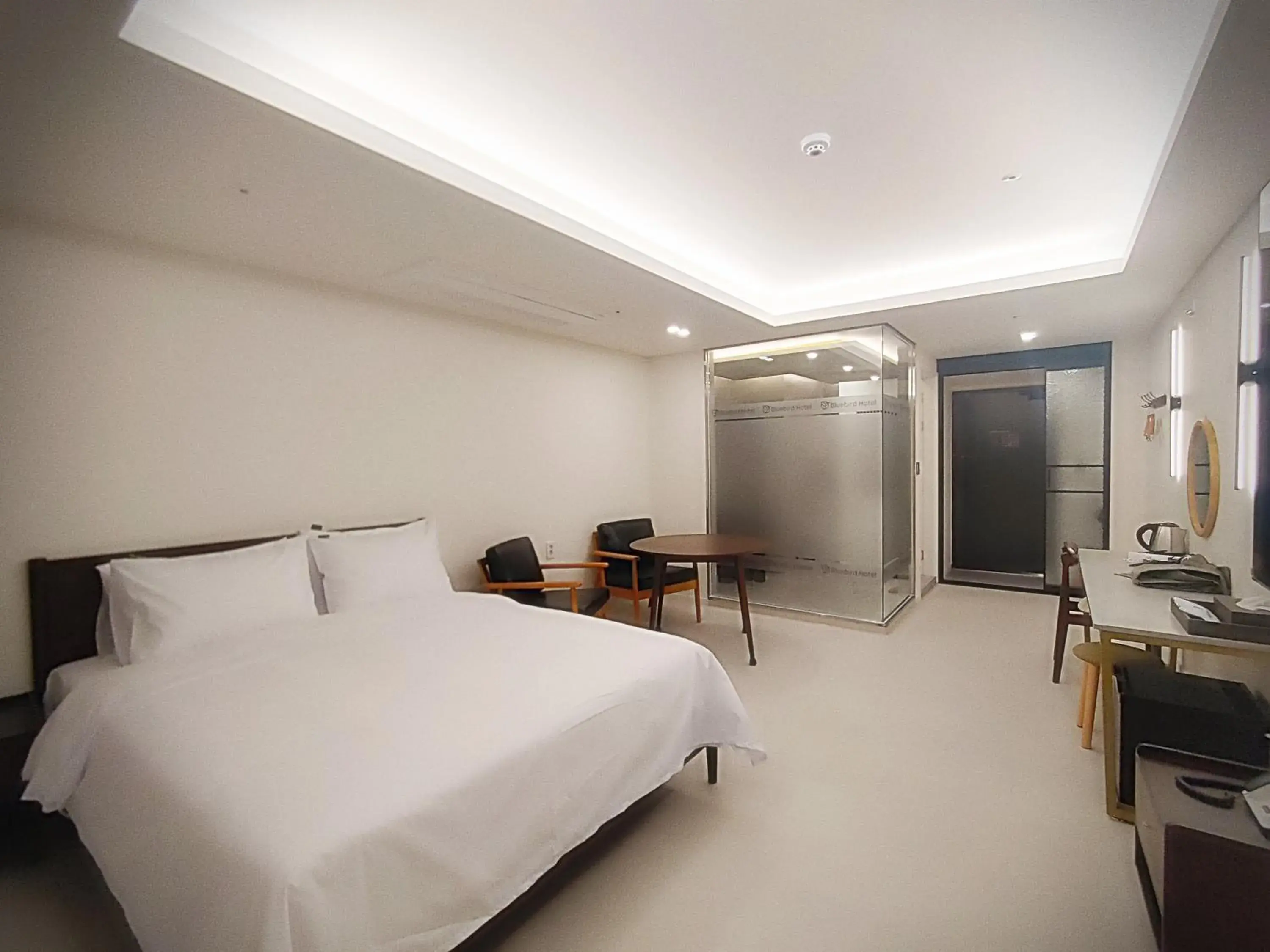 Bedroom, Bed in Bluebird Hotel Bedroom, Bed in Bluebird Hotel