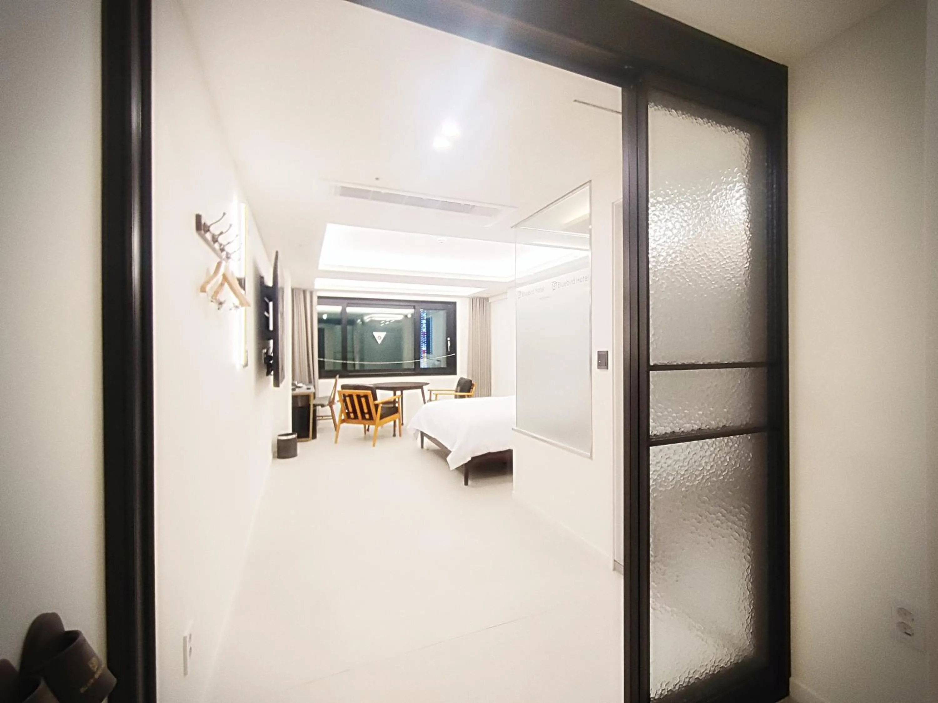 Bedroom in Bluebird Hotel