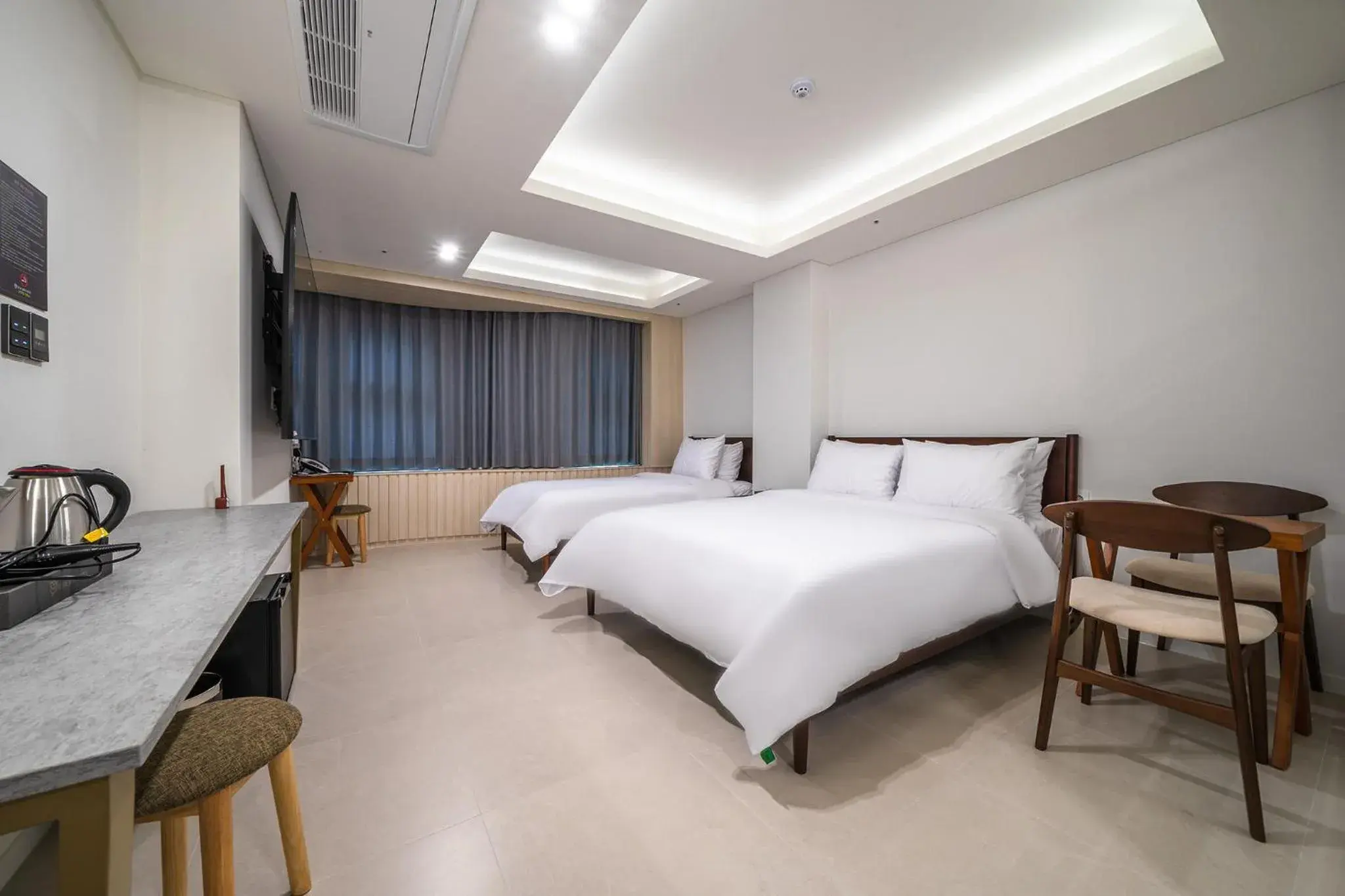 Bedroom, Bed in Bluebird Hotel Bedroom, Bed in Bluebird Hotel