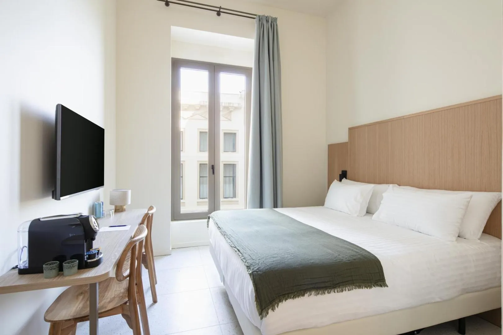 Bed in Hôtel La Suite