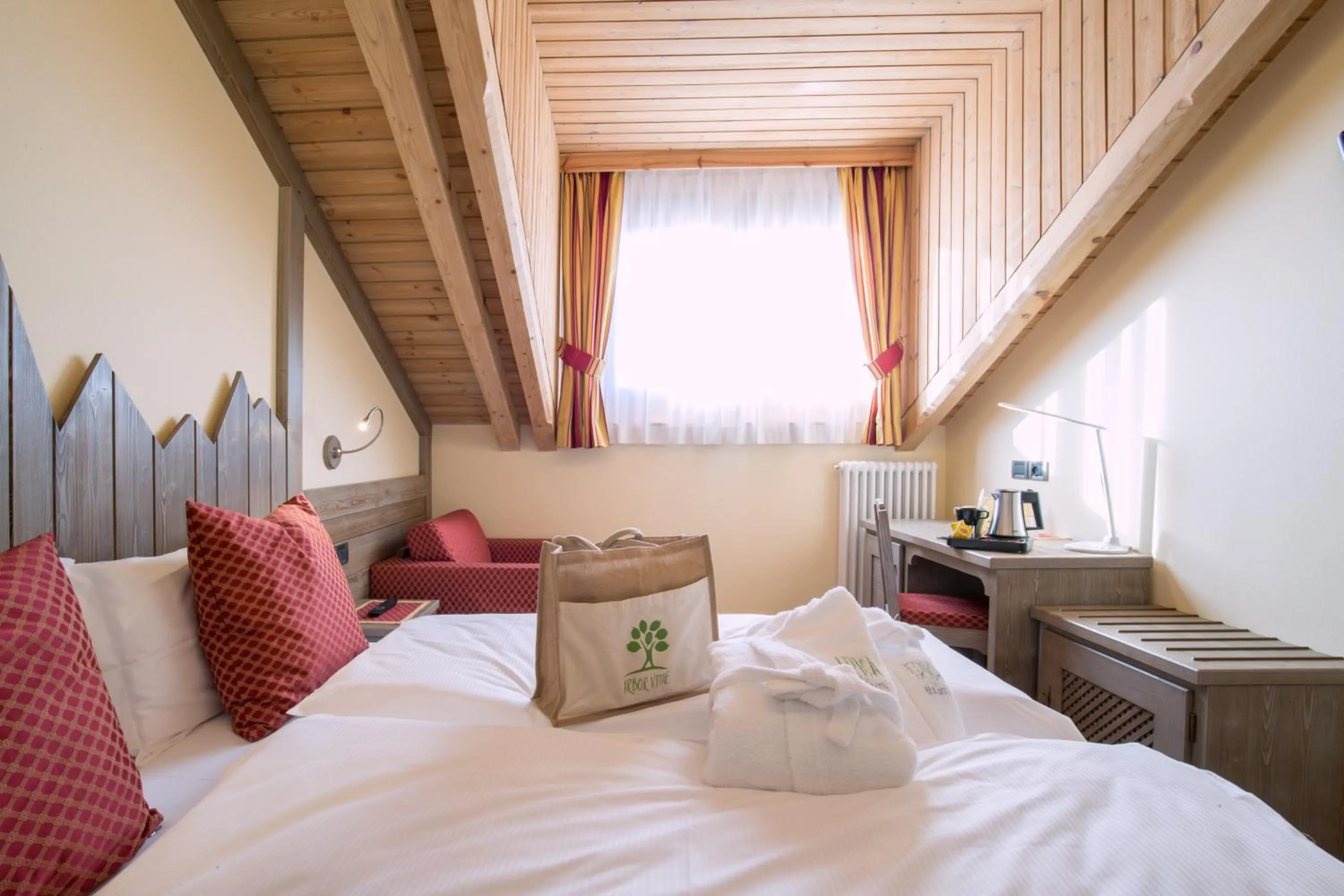 Bed in Relax Hotel Erica