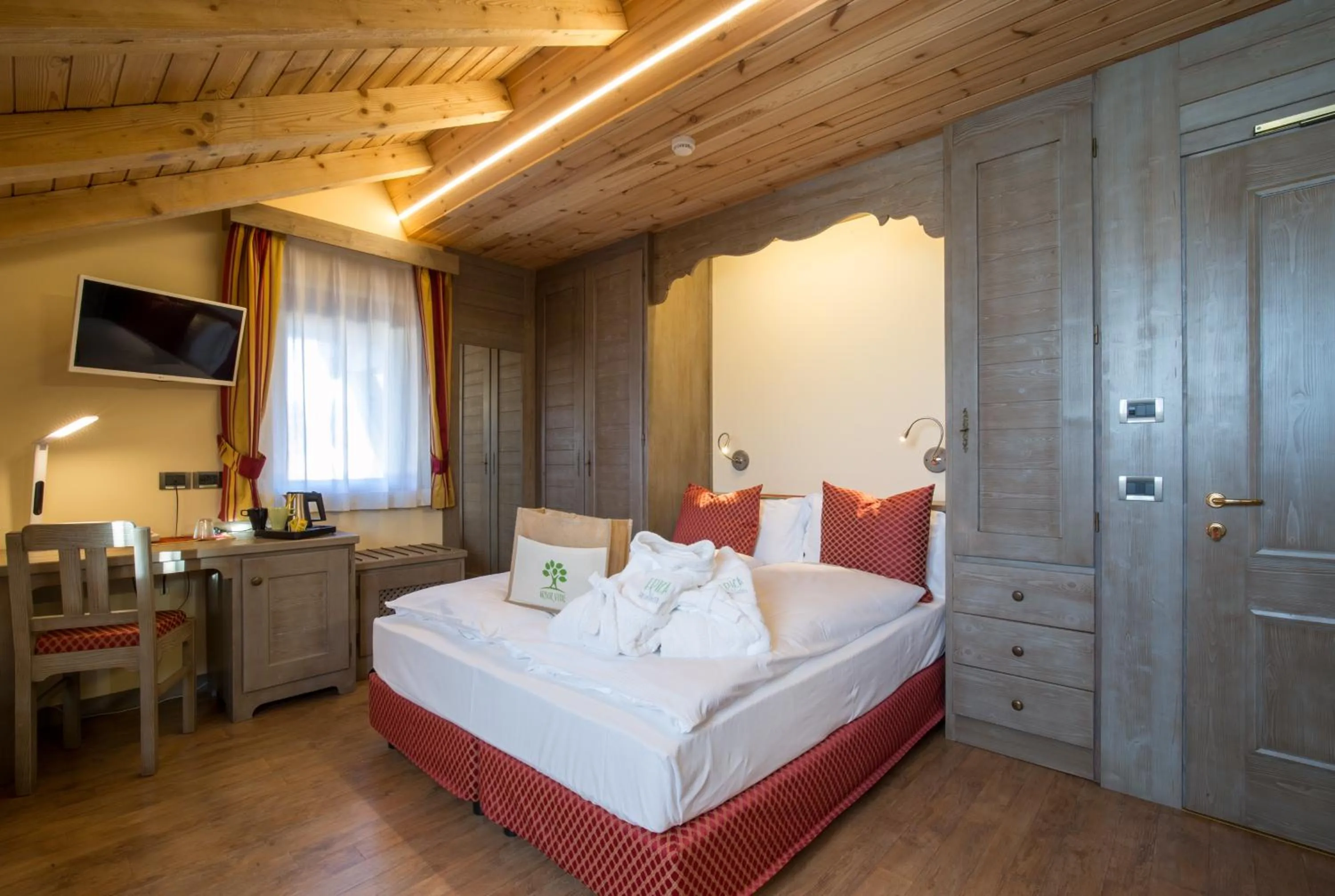 Bed in Relax Hotel Erica