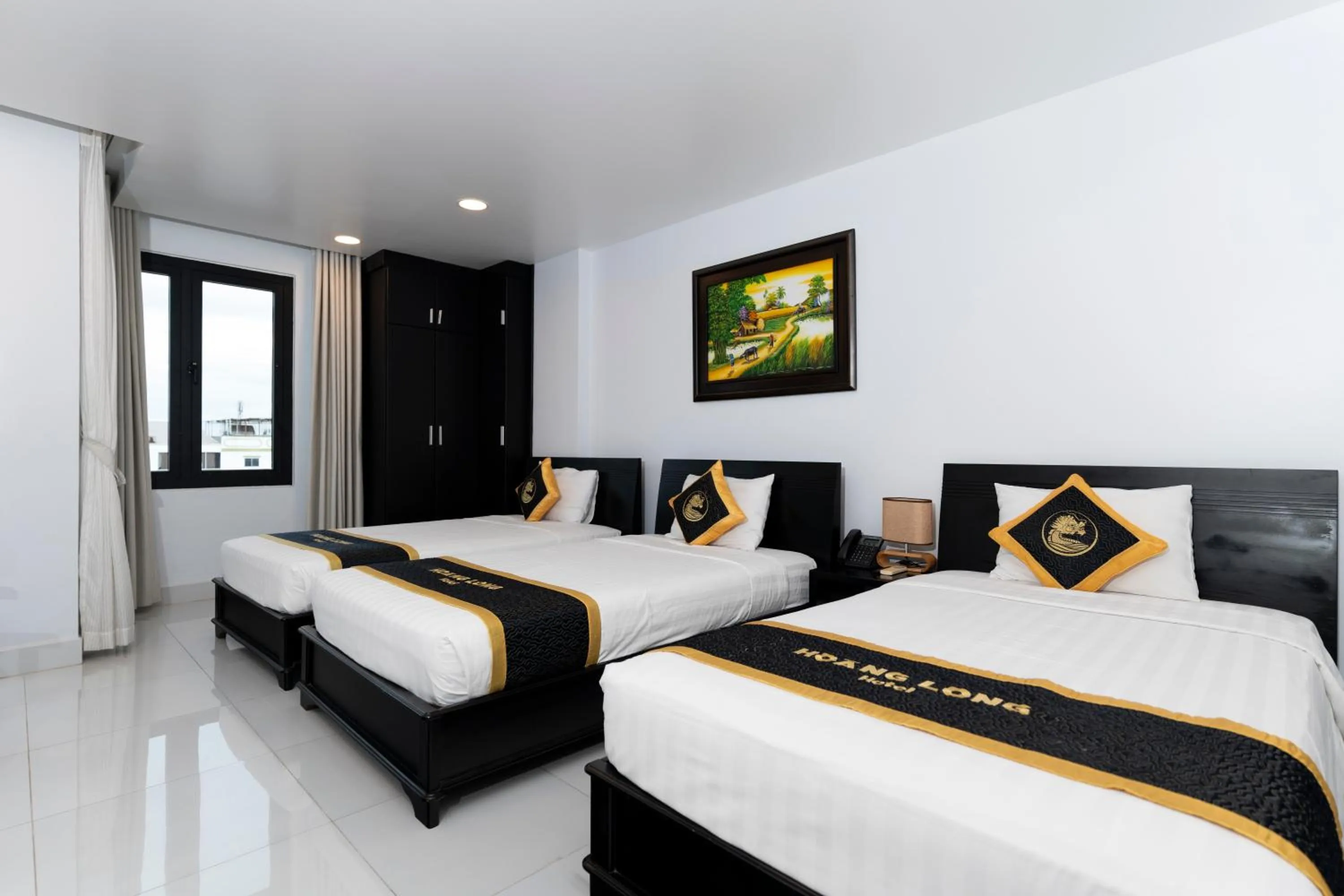 Bed in Hoang Long Hotel Phan Thiết