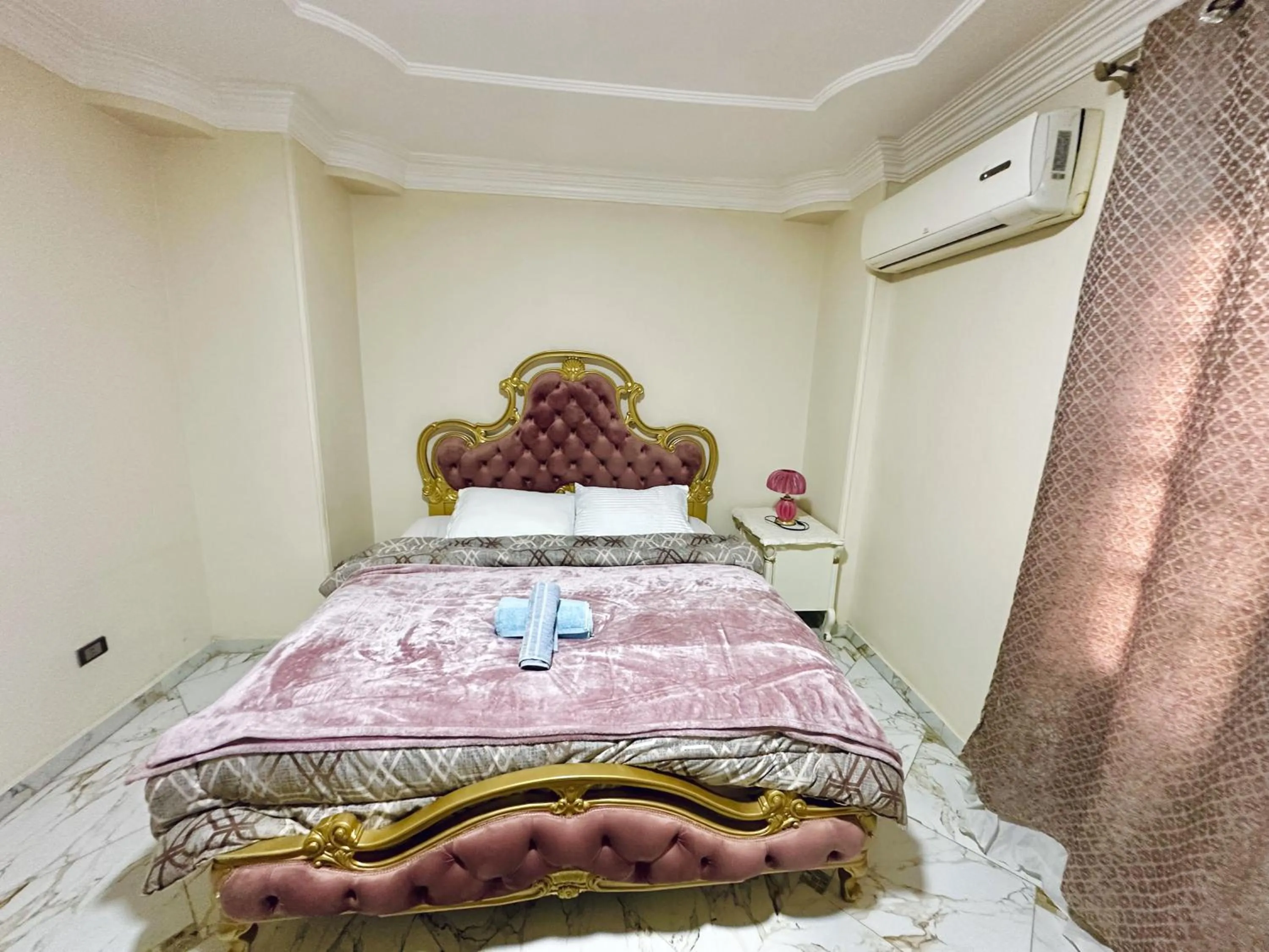 Bed in Queen of the pyramids hotel