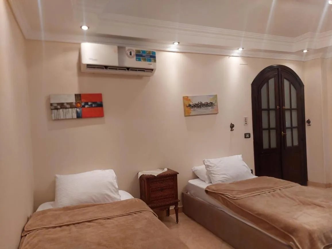 Bed in Queen of the pyramids hotel