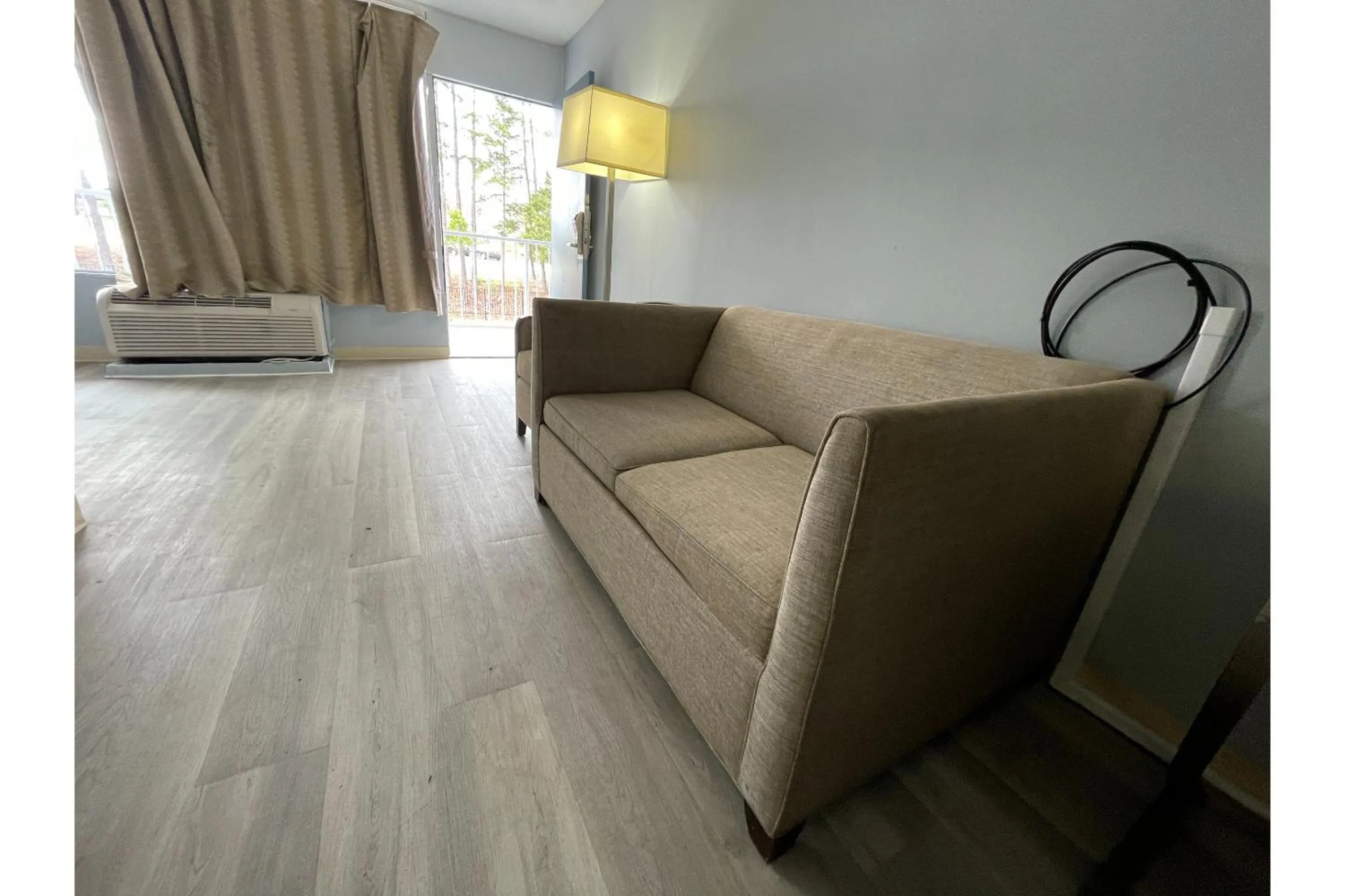 Bedroom in Lamplighter Inn by OYO Charlotte Airport Area