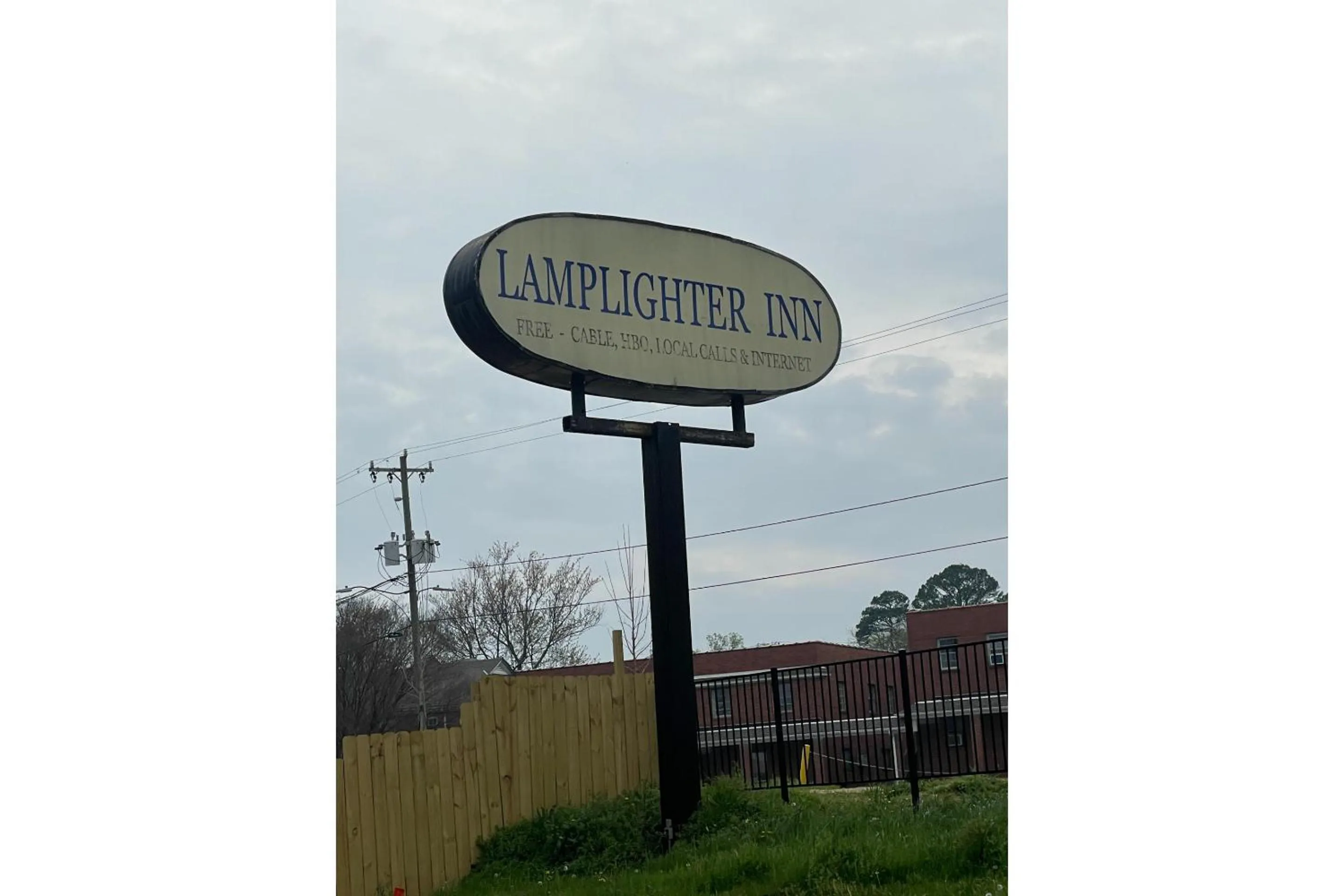 Property building in Lamplighter Inn by OYO Charlotte Airport Area