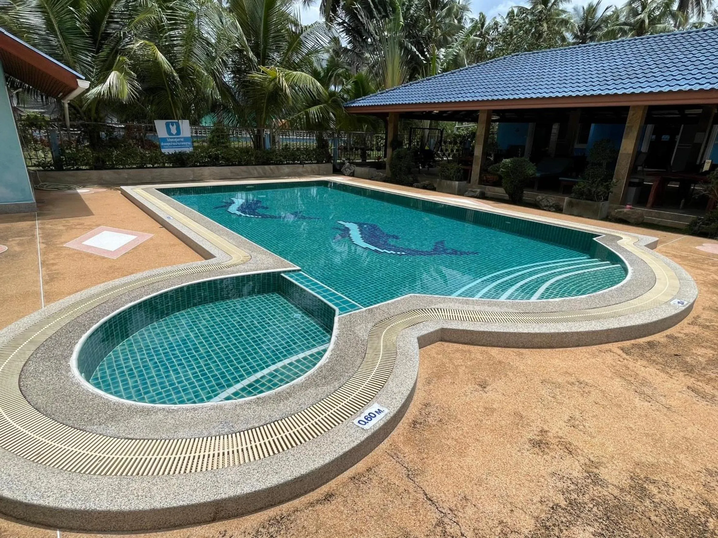 Swimming pool in Blue Beach Bungalow