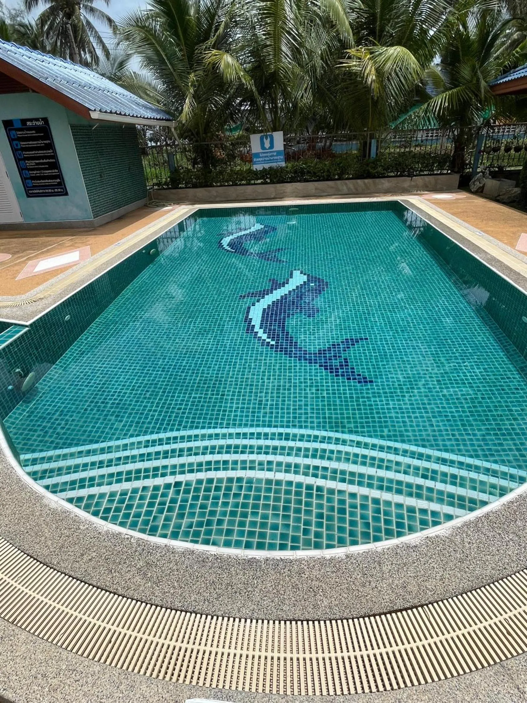 Swimming pool in Blue Beach Bungalow