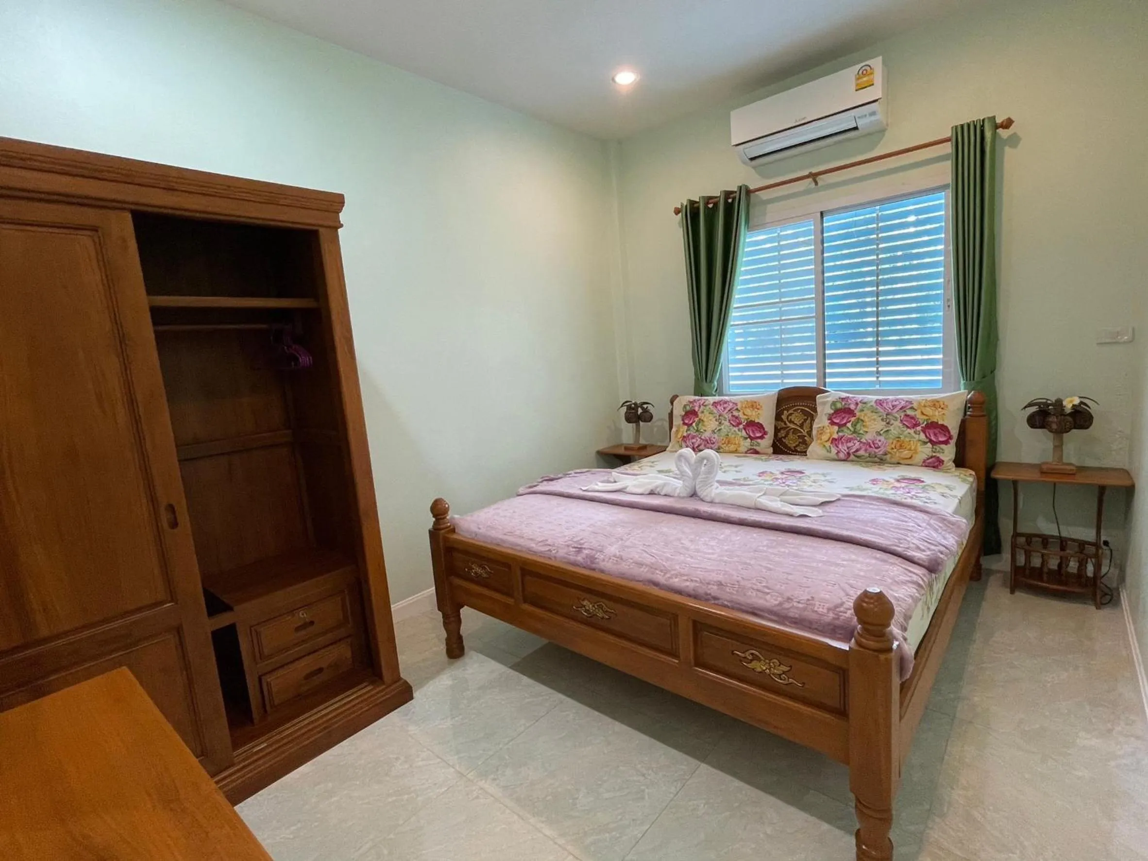 Bed in Blue Beach Bungalow