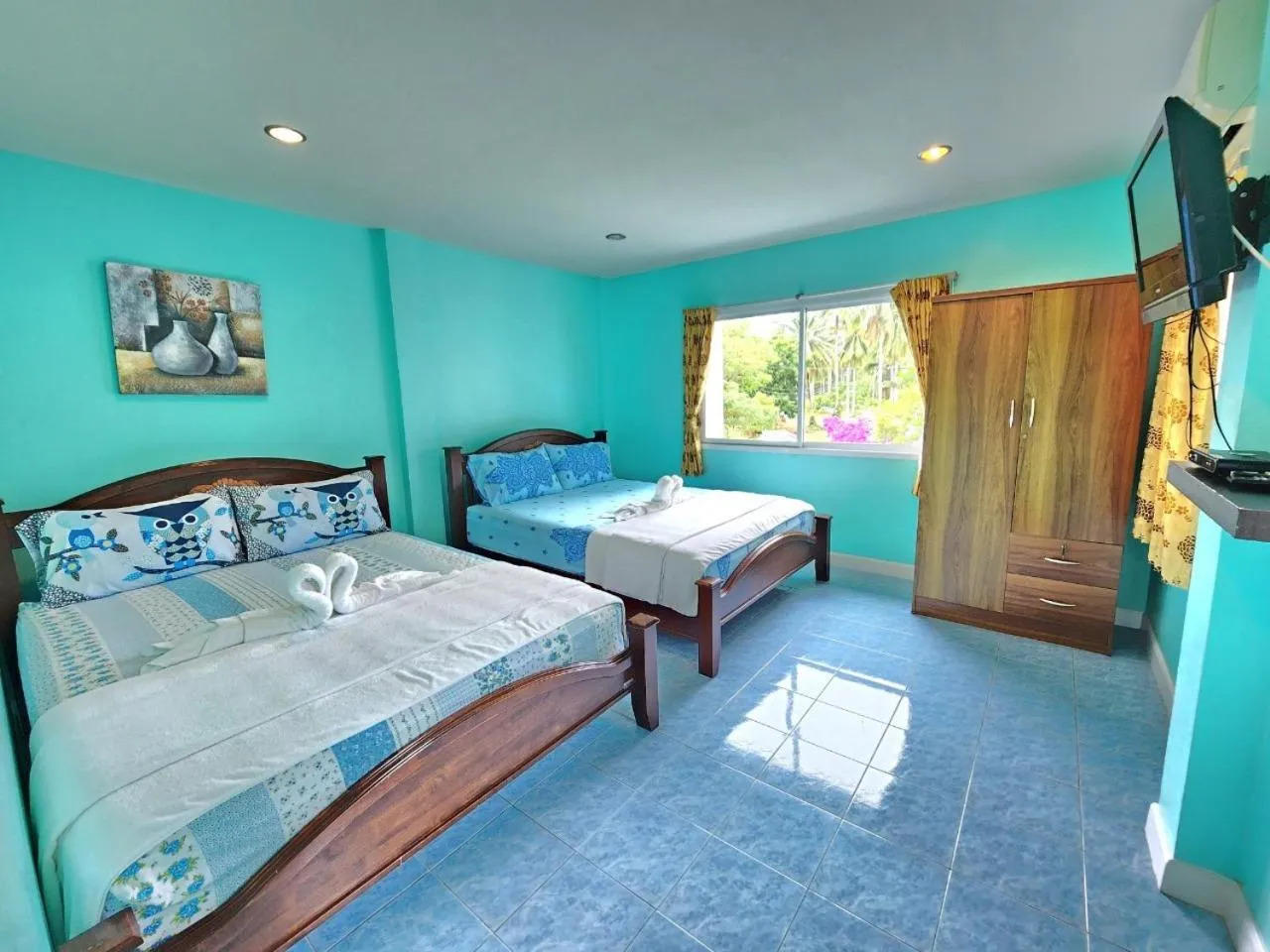 Bed in Blue Beach Bungalow