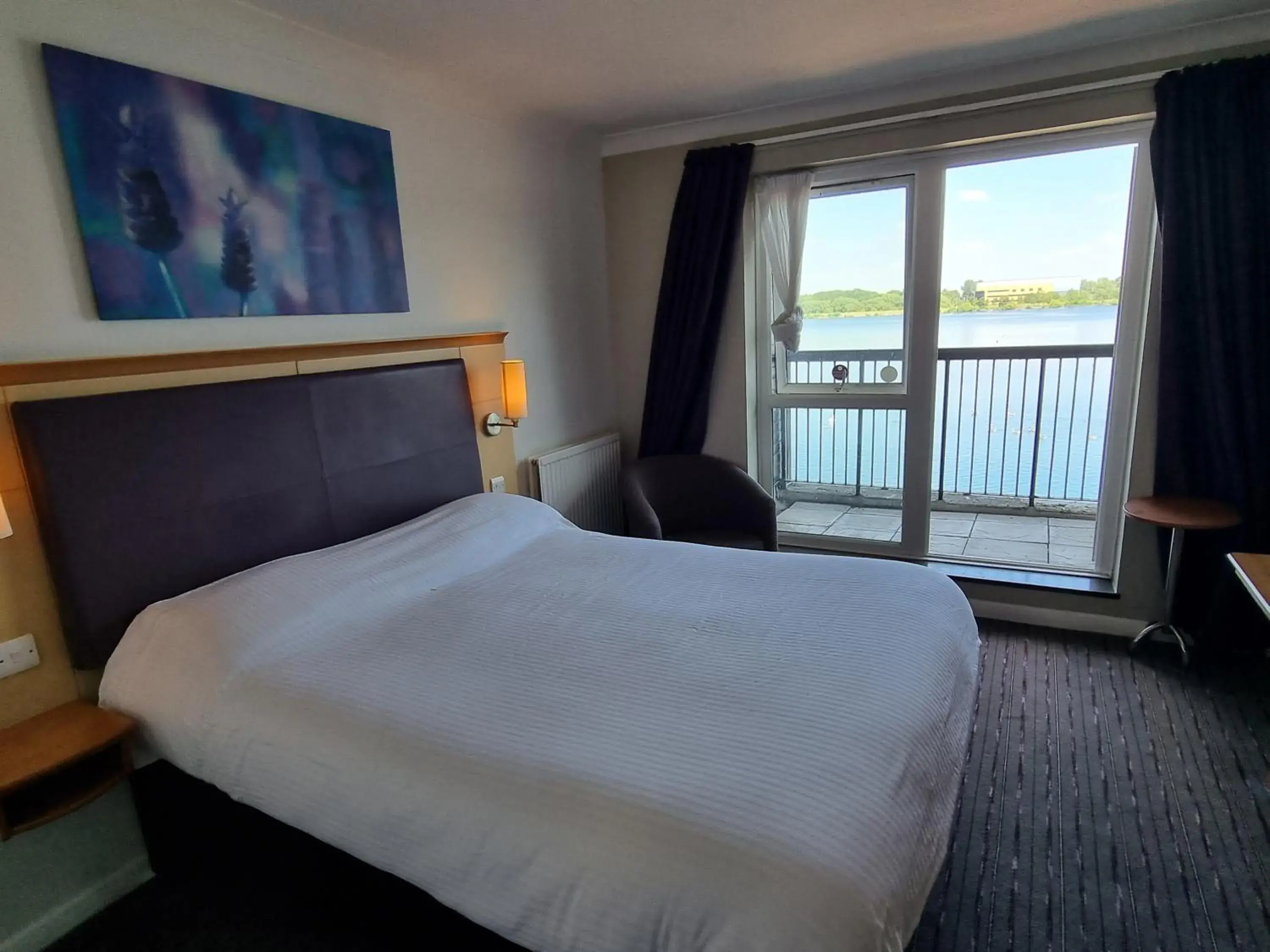 Bed in The Willen Lodge Hotel Bed in The Willen Lodge Hotel