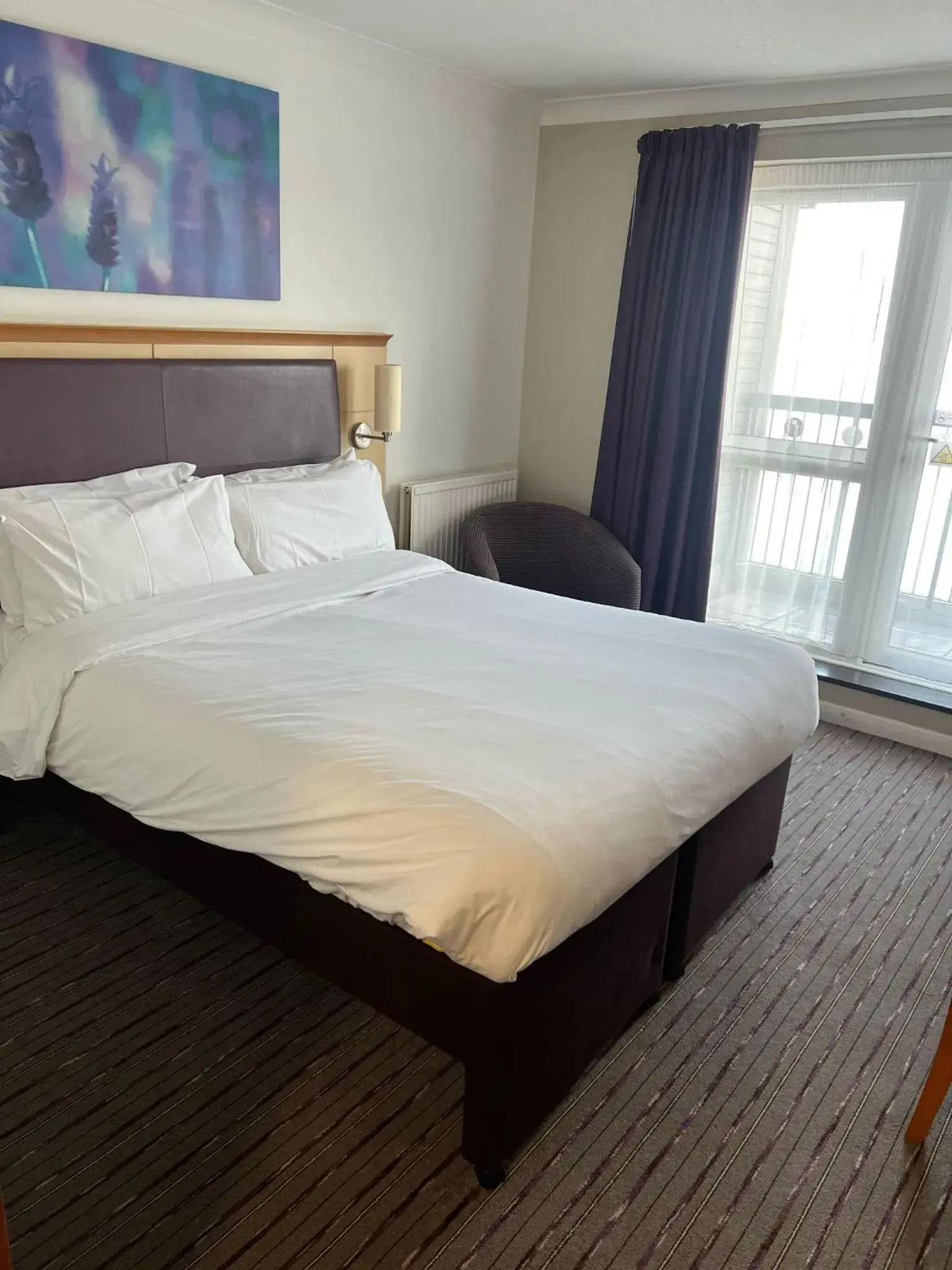 Bed in The Willen Lodge Hotel Bed in The Willen Lodge Hotel