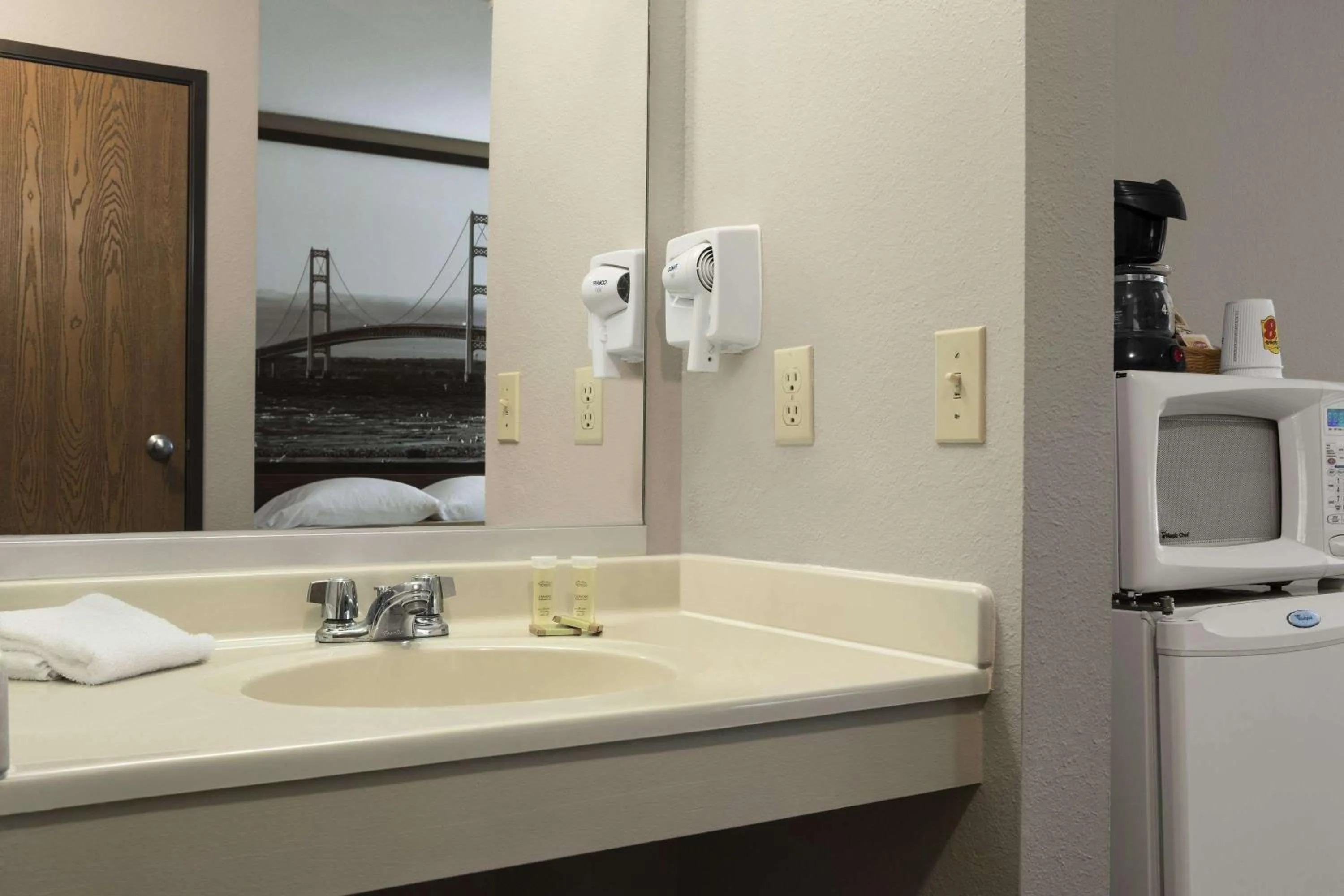 Bathroom in Super 8 by Wyndham Manistee