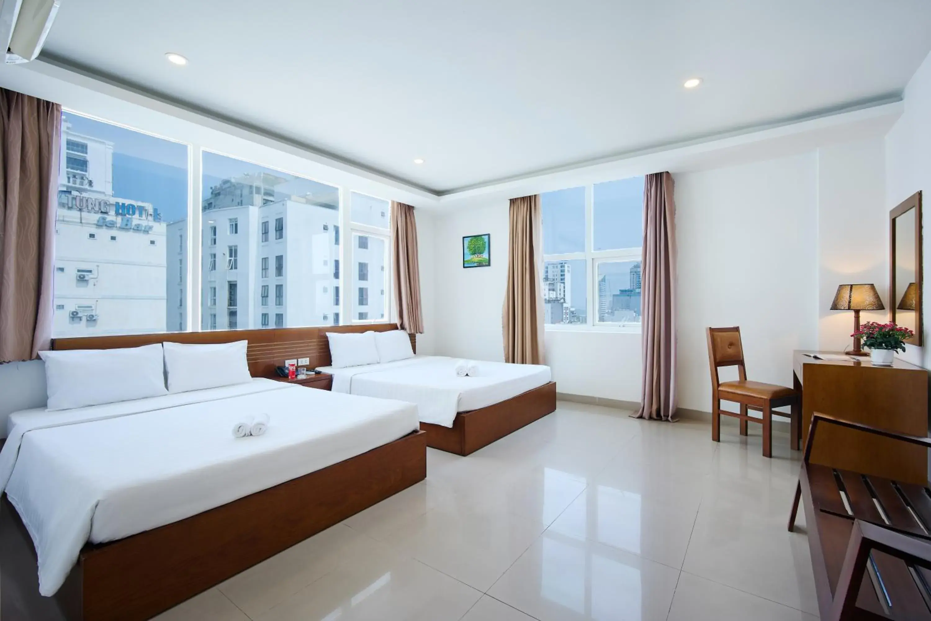 Bed in Golden Light Da Nang Hotel Bed in Golden Light Da Nang Hotel