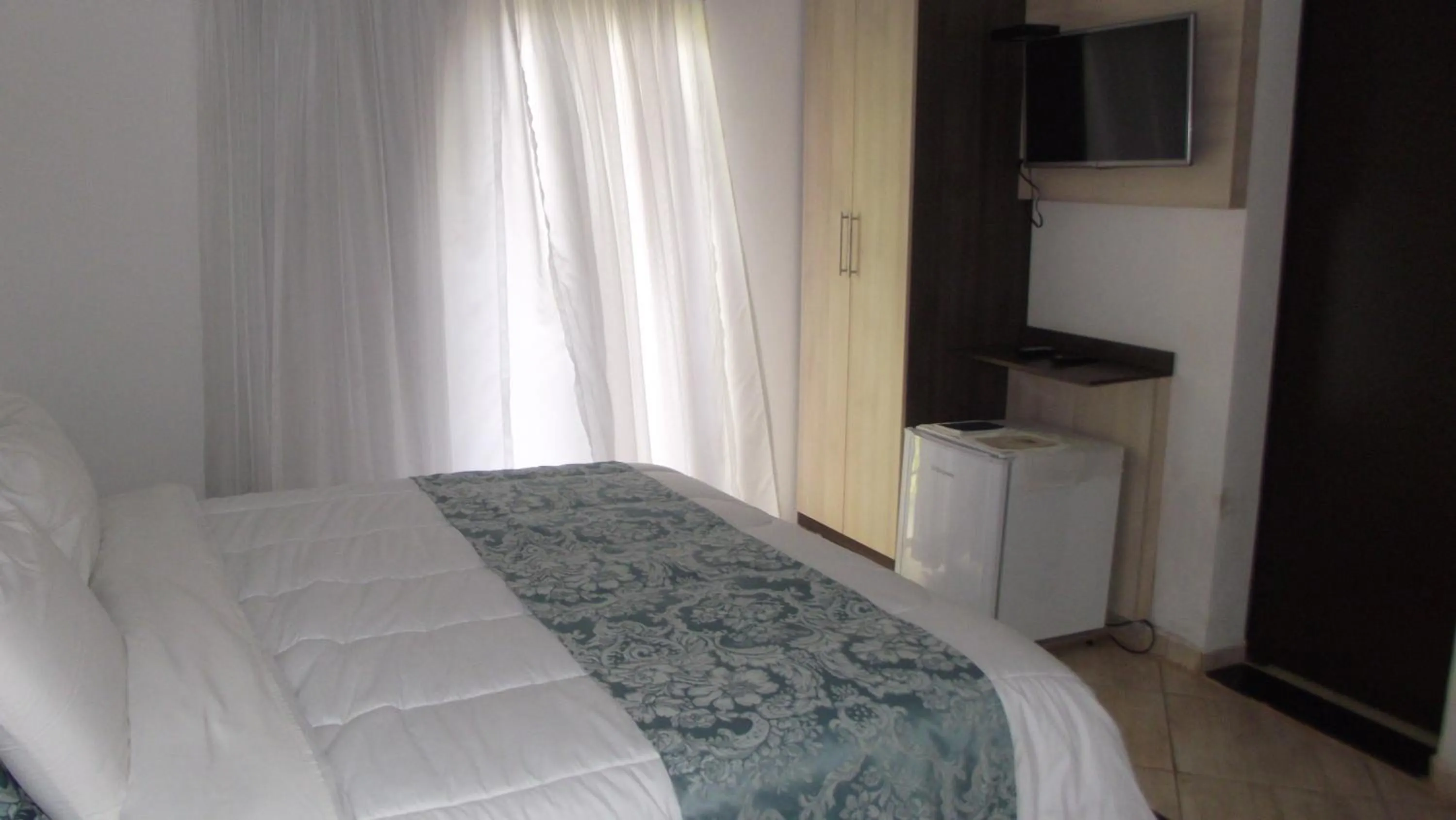 Photo of the whole room, Bed in Hotel Nova Odessa - OFICIAL