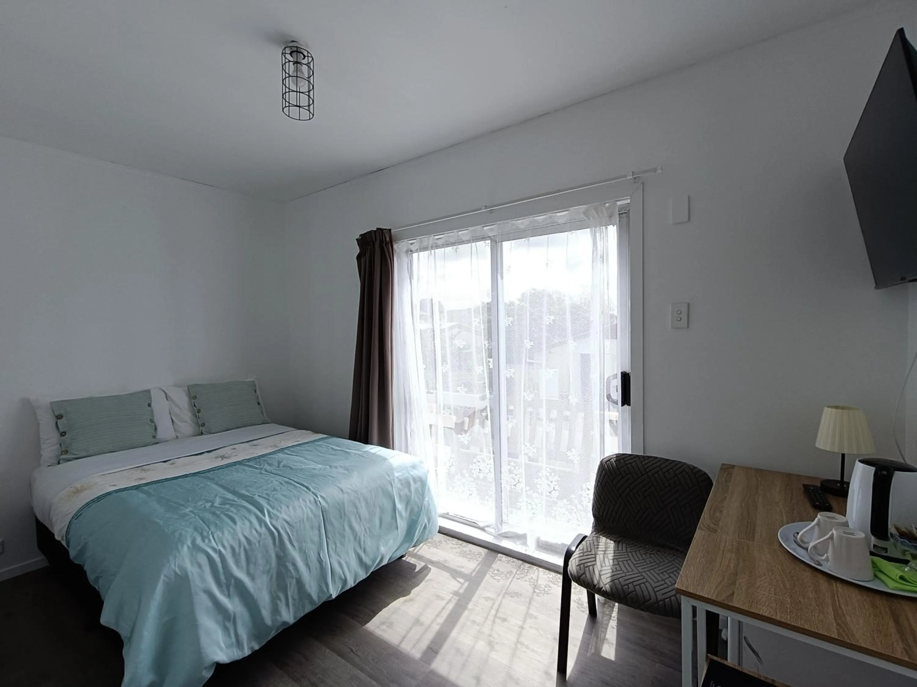 Bed in Rainbow Motel & Guest House