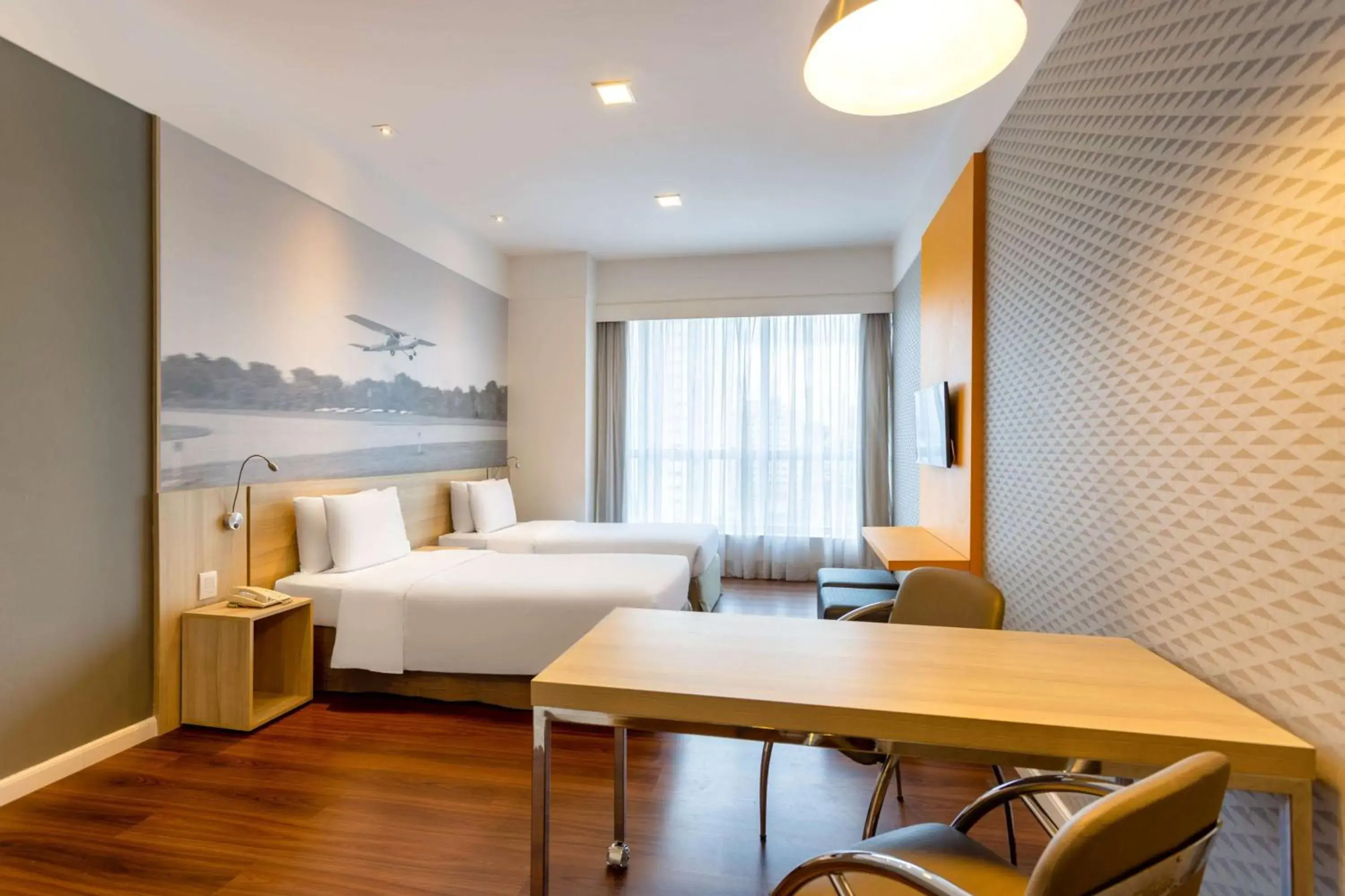 Photo of the whole room, Bed in Wyndham Garden São Paulo Convention Nortel Photo of the whole room, Bed in Wyndham Garden São Paulo Convention Nortel