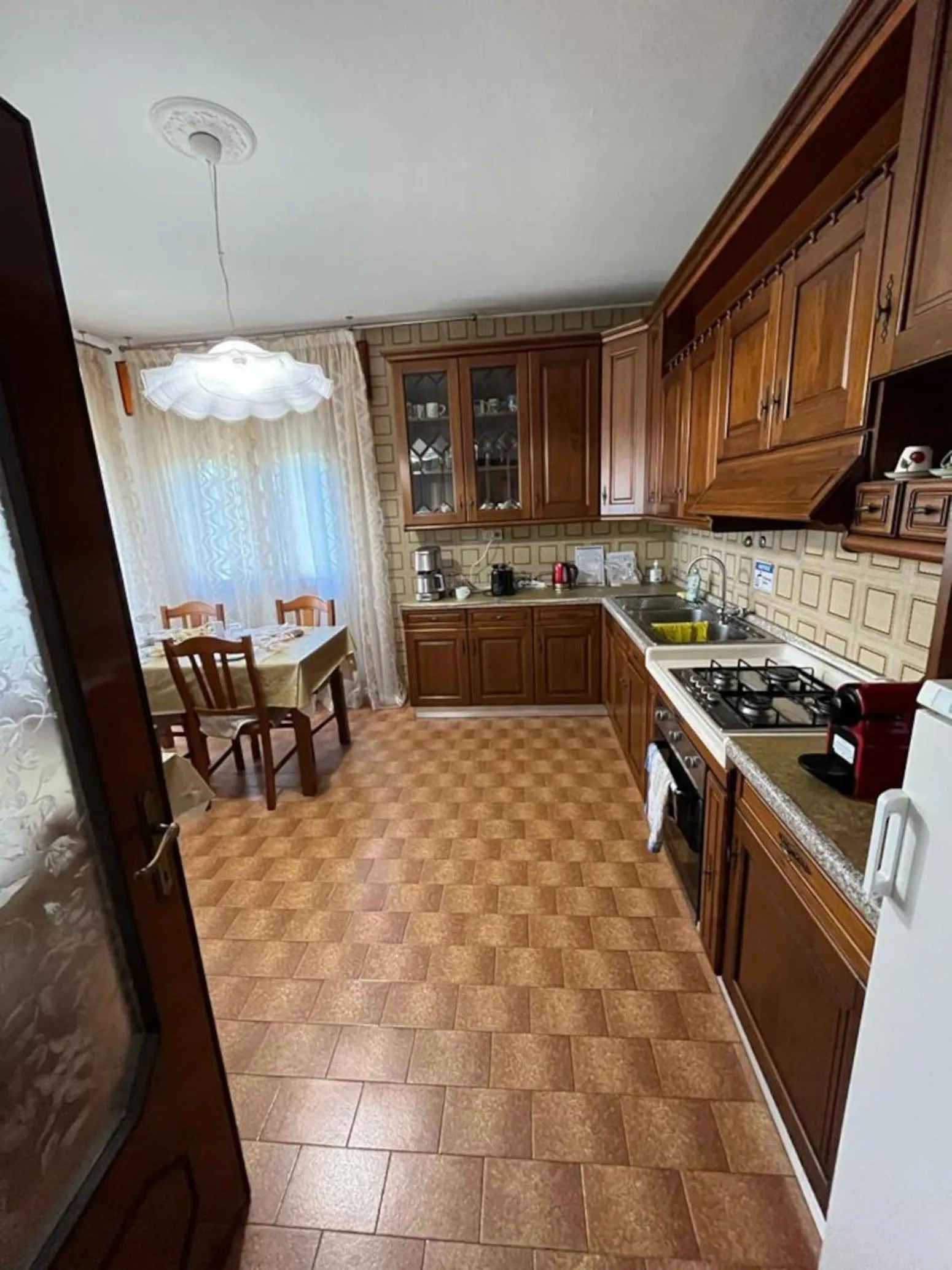 Communal kitchen in B&B Airport Venice Diego