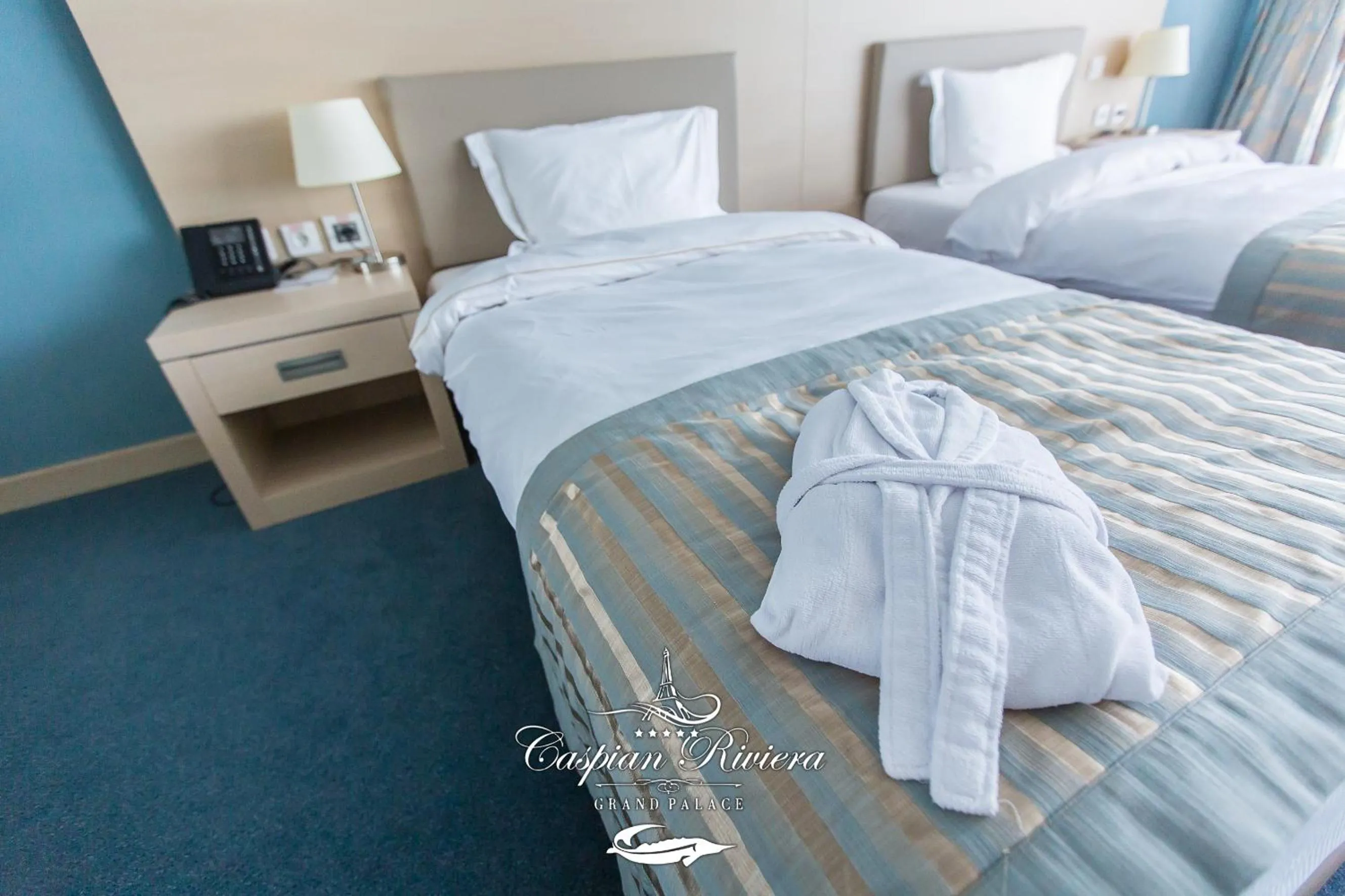 Bed in Caspian Riviera Grand Palace Hotel