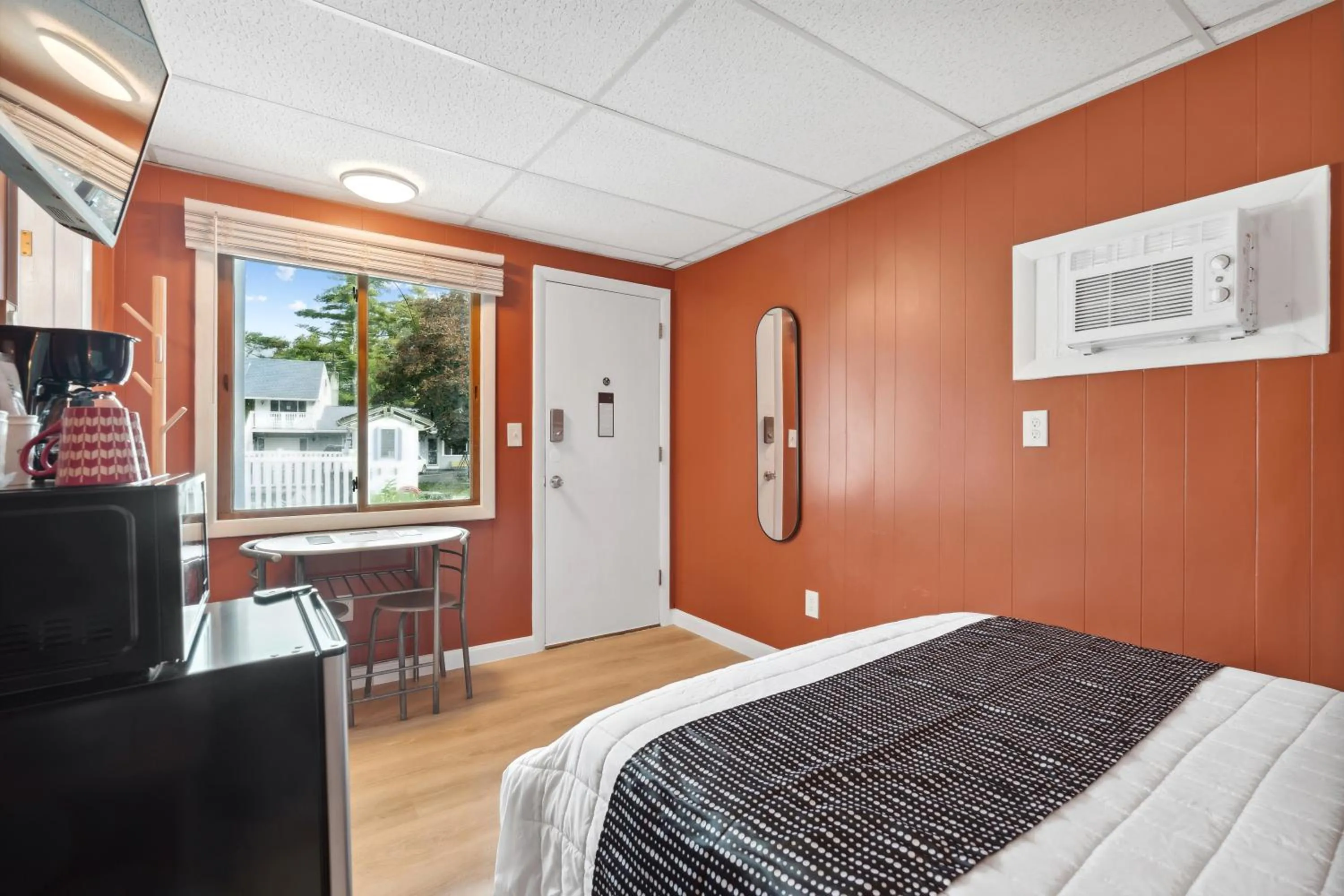 Bed in The Beaches Guestrooms and Cottages