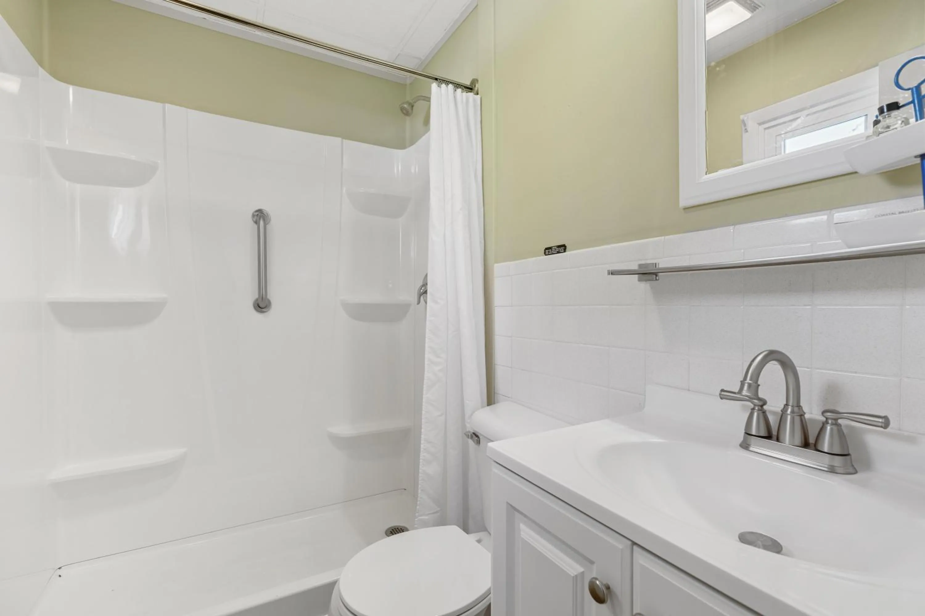 Shower in The Beaches Guestrooms and Cottages