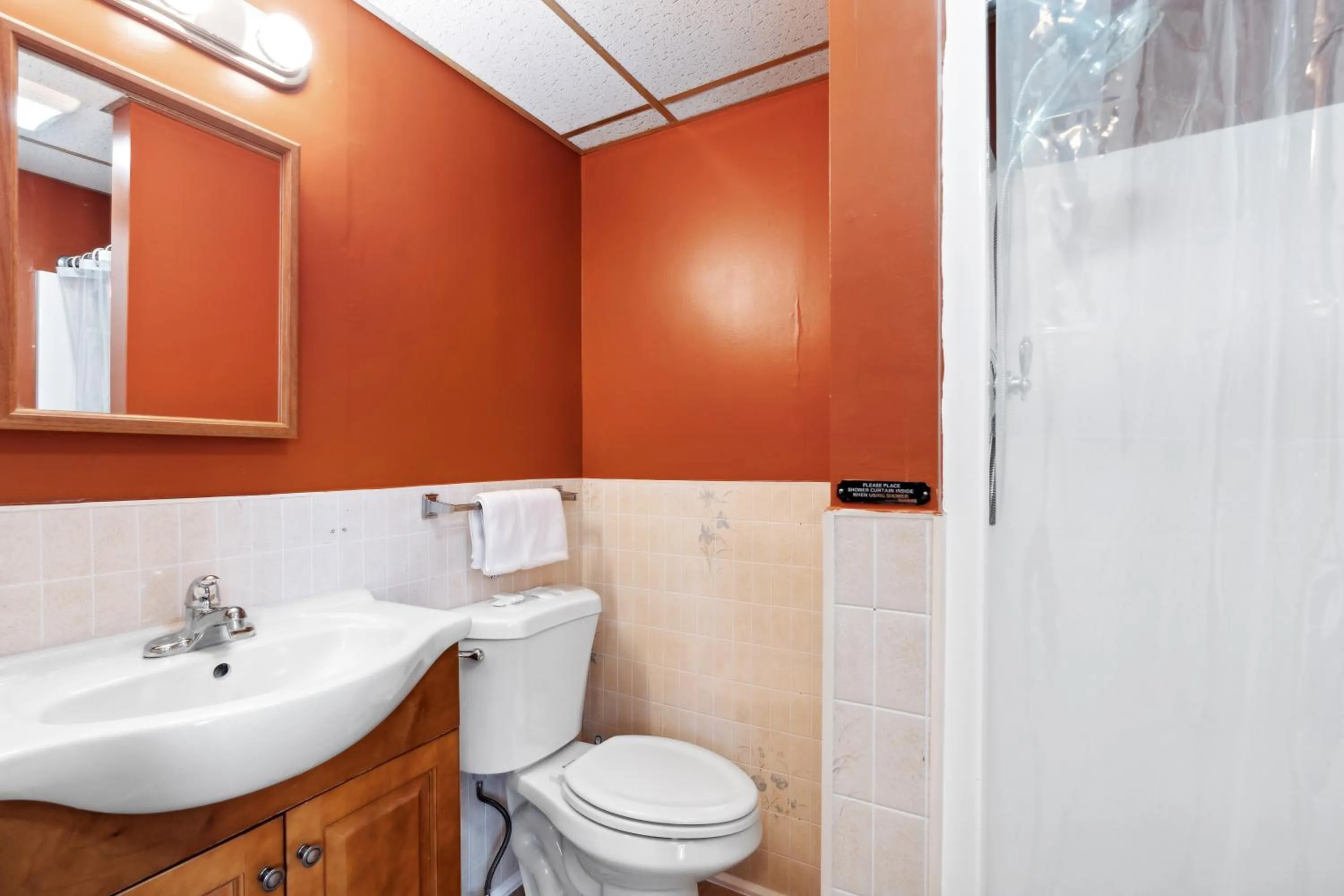 Shower in The Beaches Guestrooms and Cottages