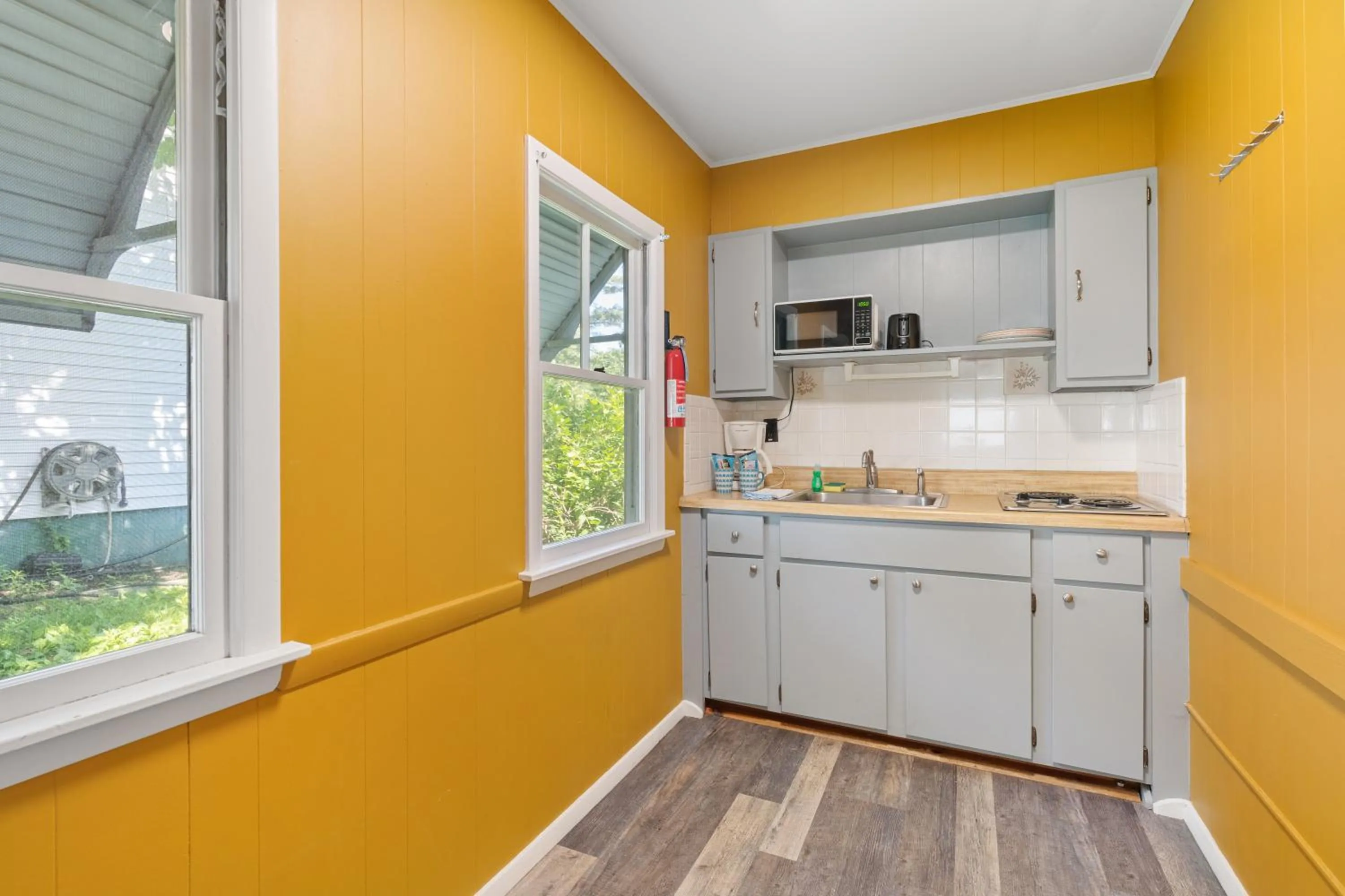Kitchen or kitchenette in The Beaches Guestrooms and Cottages