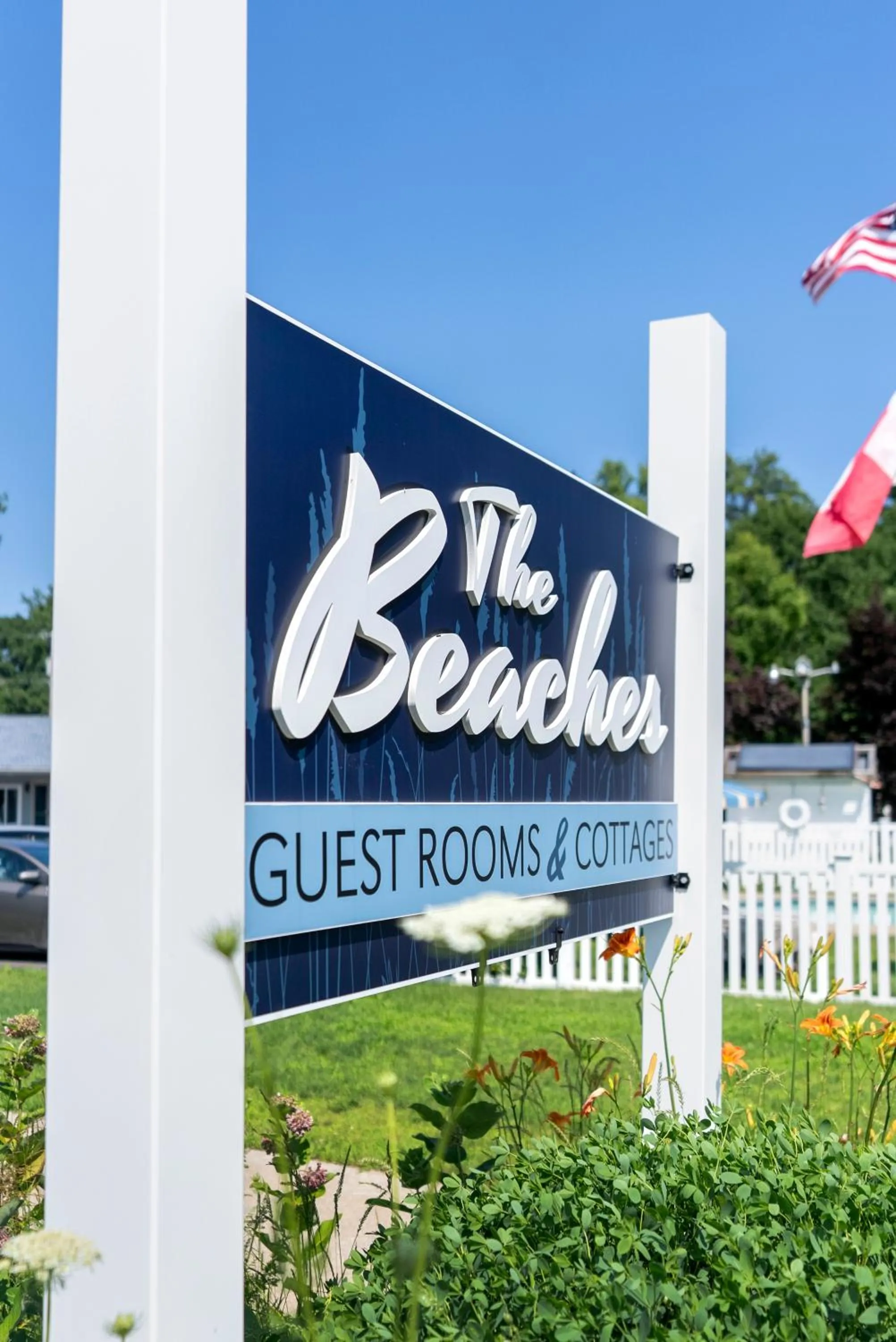 Property logo or sign in The Beaches Guestrooms and Cottages