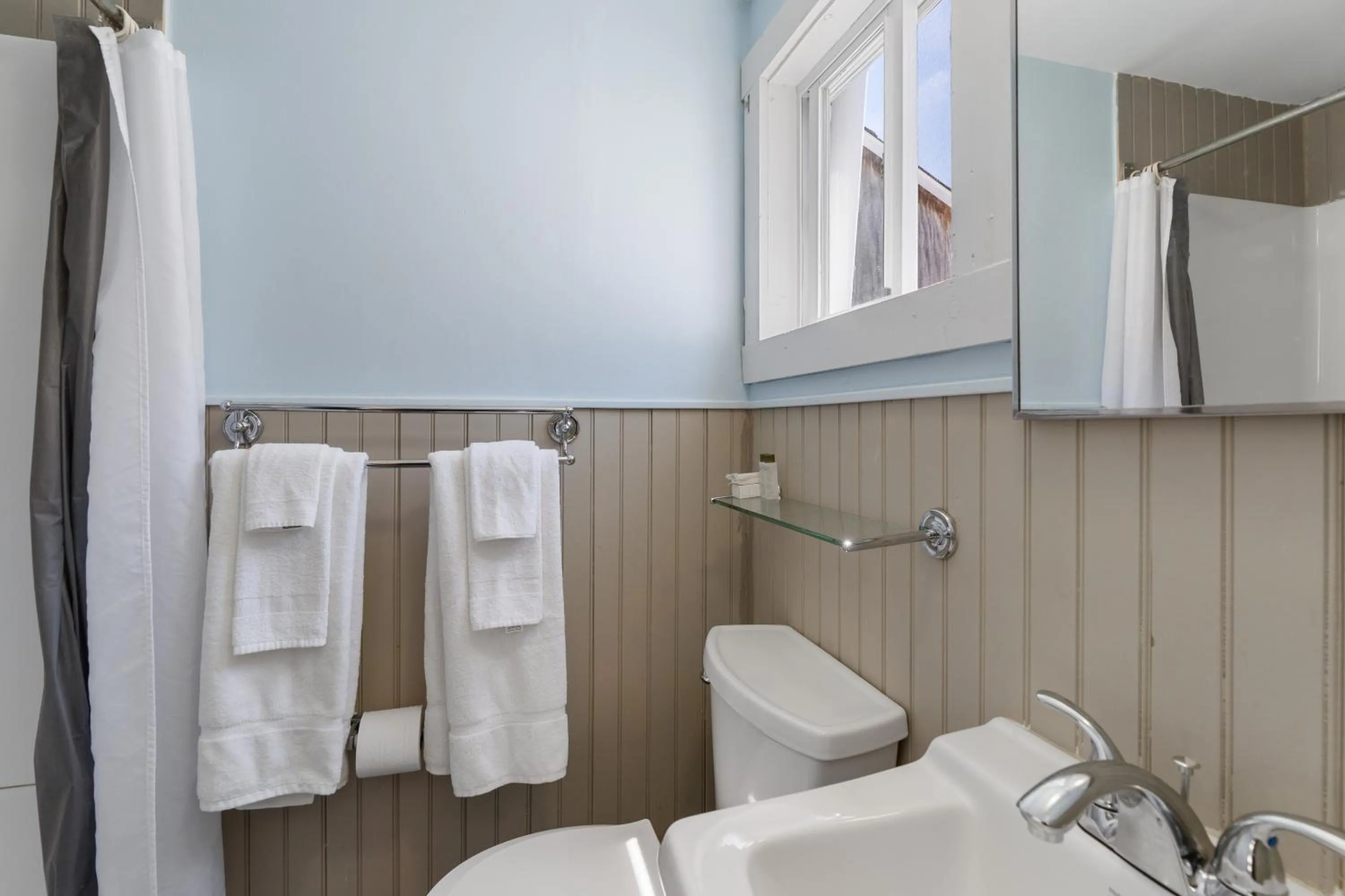 Shower in The Beaches Guestrooms and Cottages