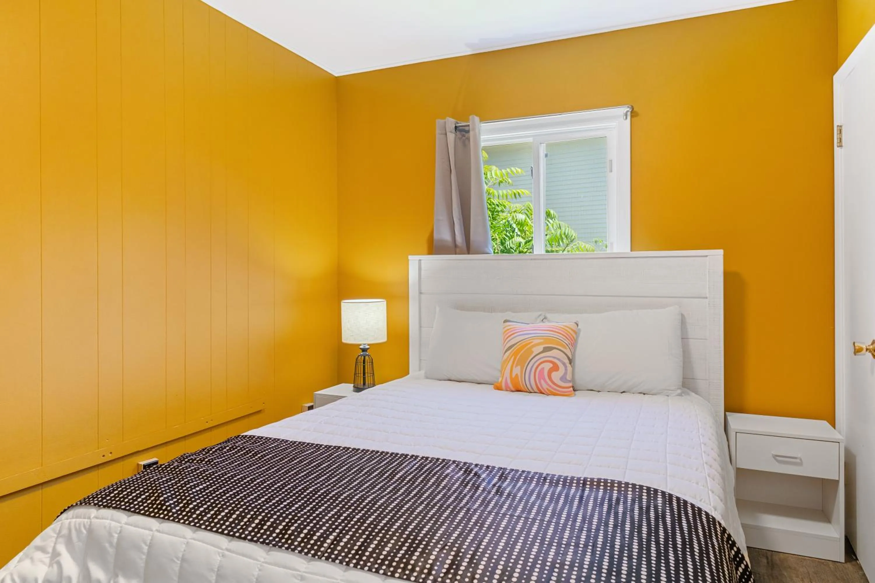 Bed in The Beaches Guestrooms and Cottages