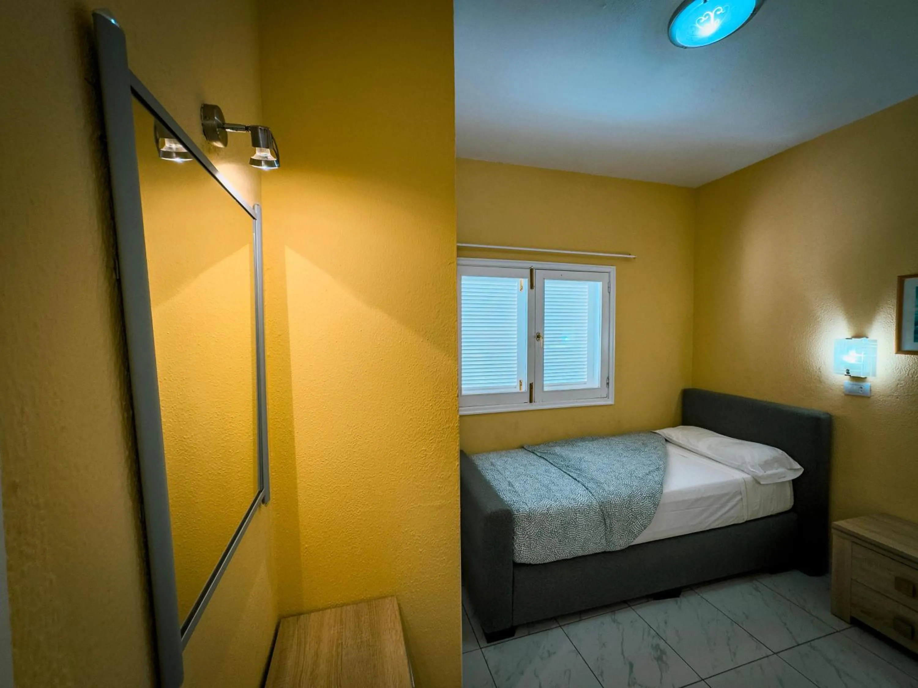 Bed in Aparthotel MONTERREY