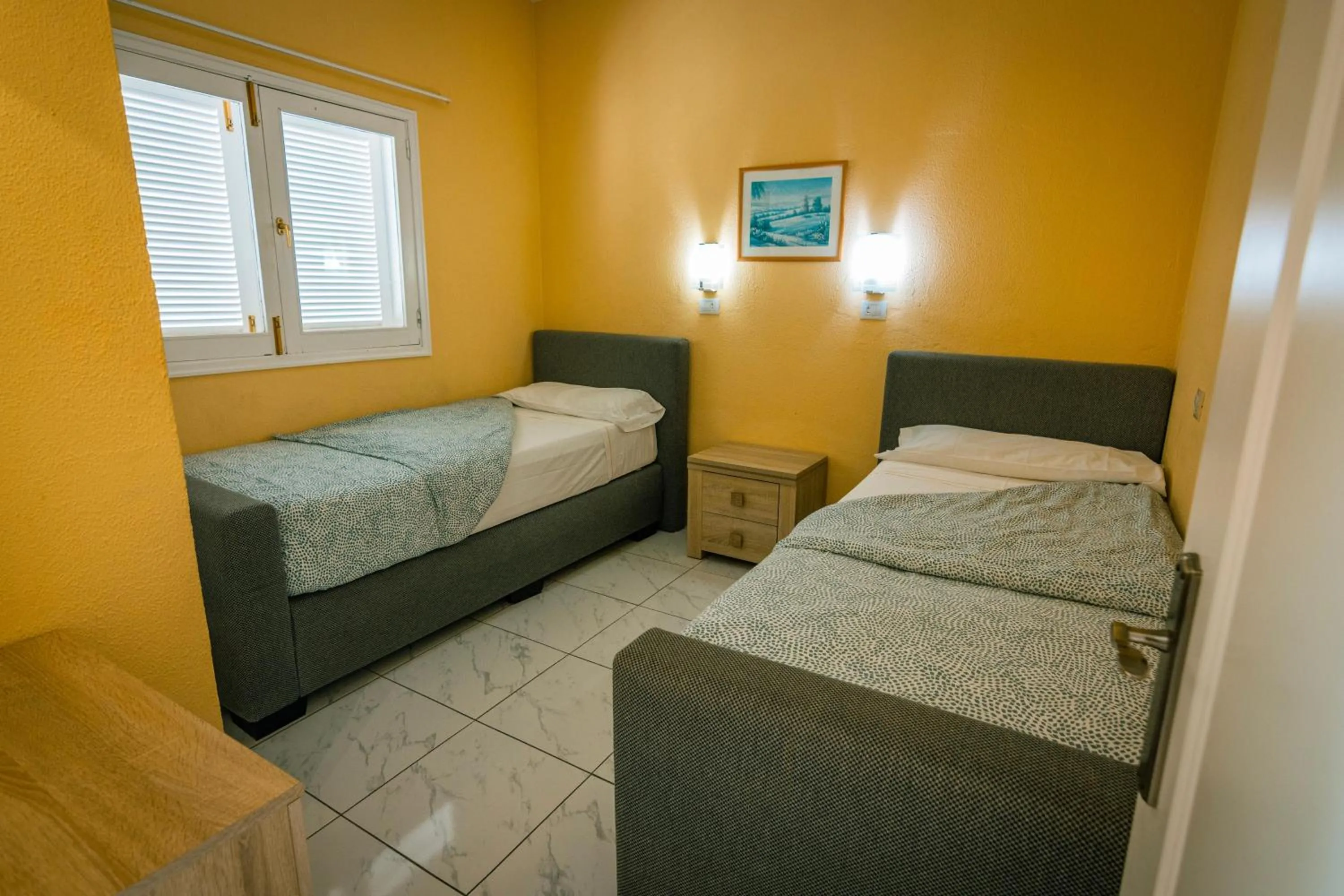 Bed in Aparthotel MONTERREY